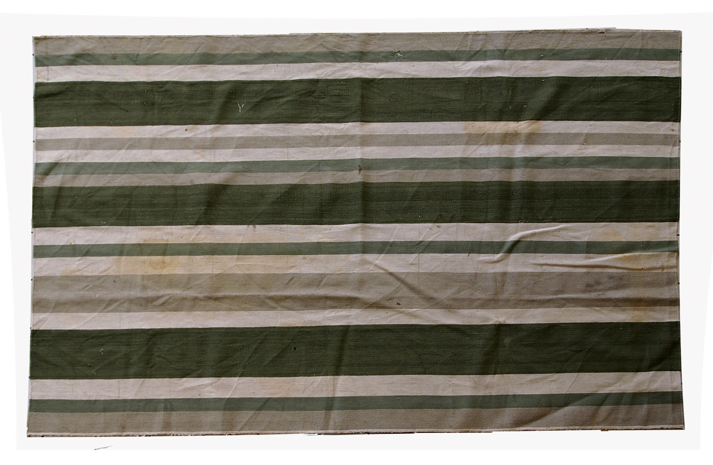 This kilim has very simple stripes motive in dark green, white and grey shades. It is in original condition from the beginning of 20th century, has some stains.