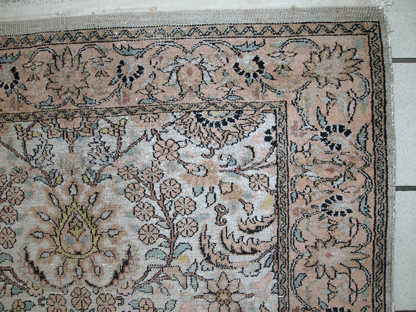 Vintage silk Indo-Tabriz rug in original condition, it has some low pile. This rug has been made in the middle of 20th century in India.