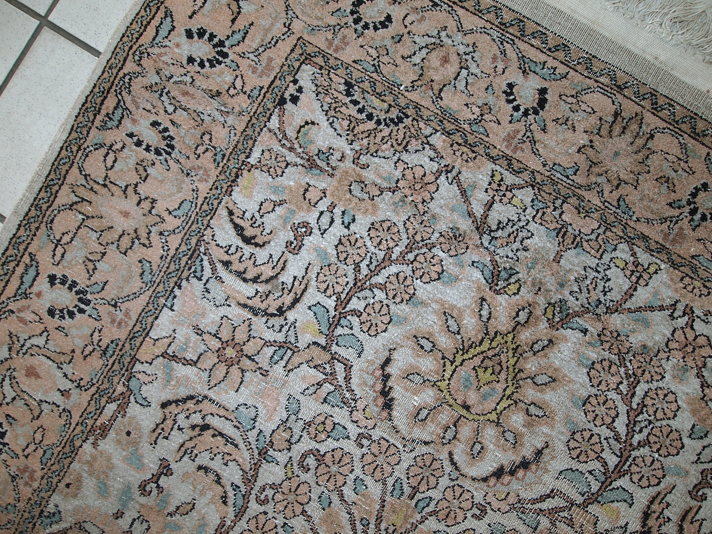 Vintage silk Indo-Tabriz rug in original condition, it has some low pile. This rug has been made in the middle of 20th century in India.