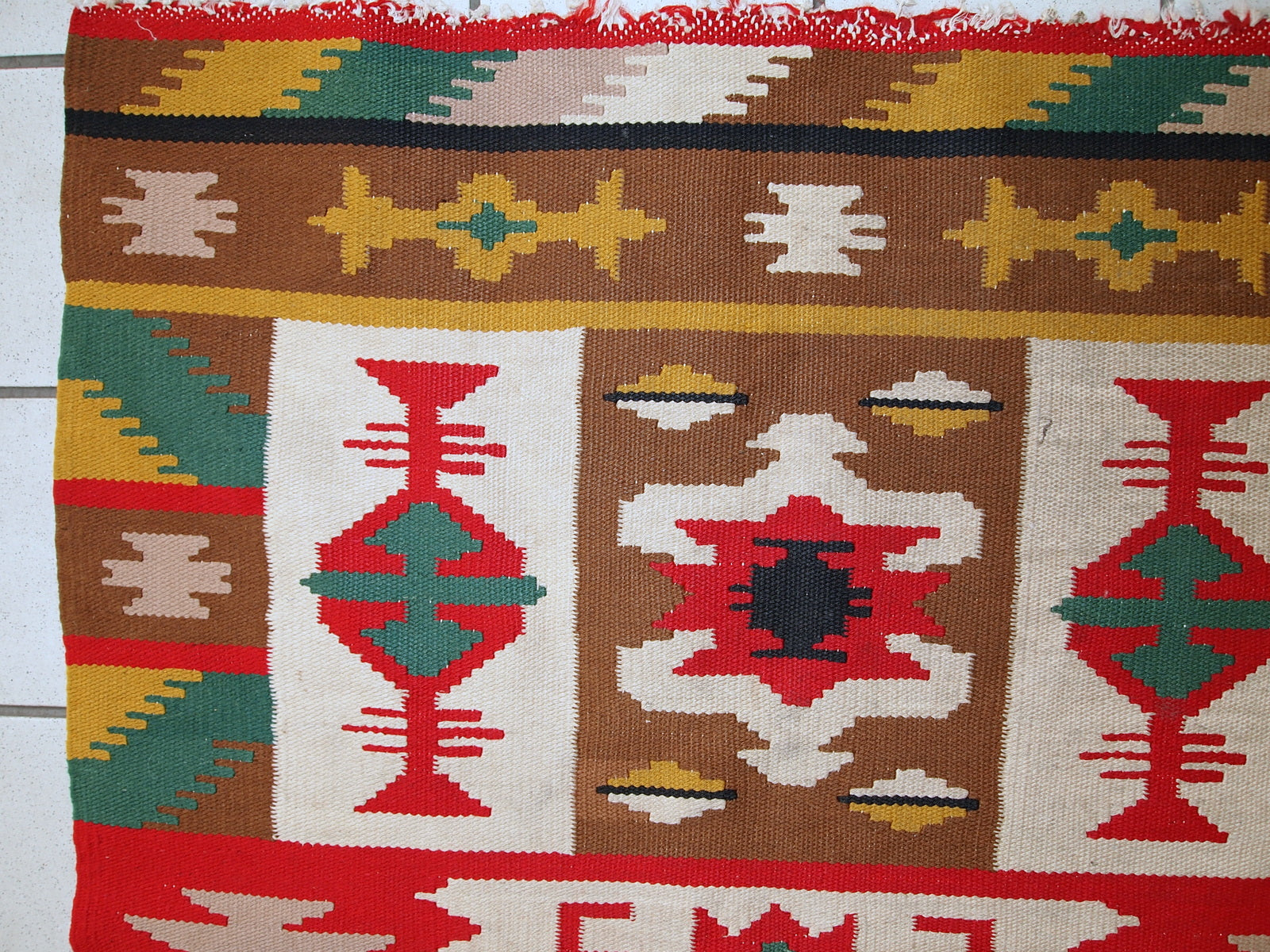 Handmade vintage Turkish Anatolian kilim in bright shades. The condition is original, some signs of age. 