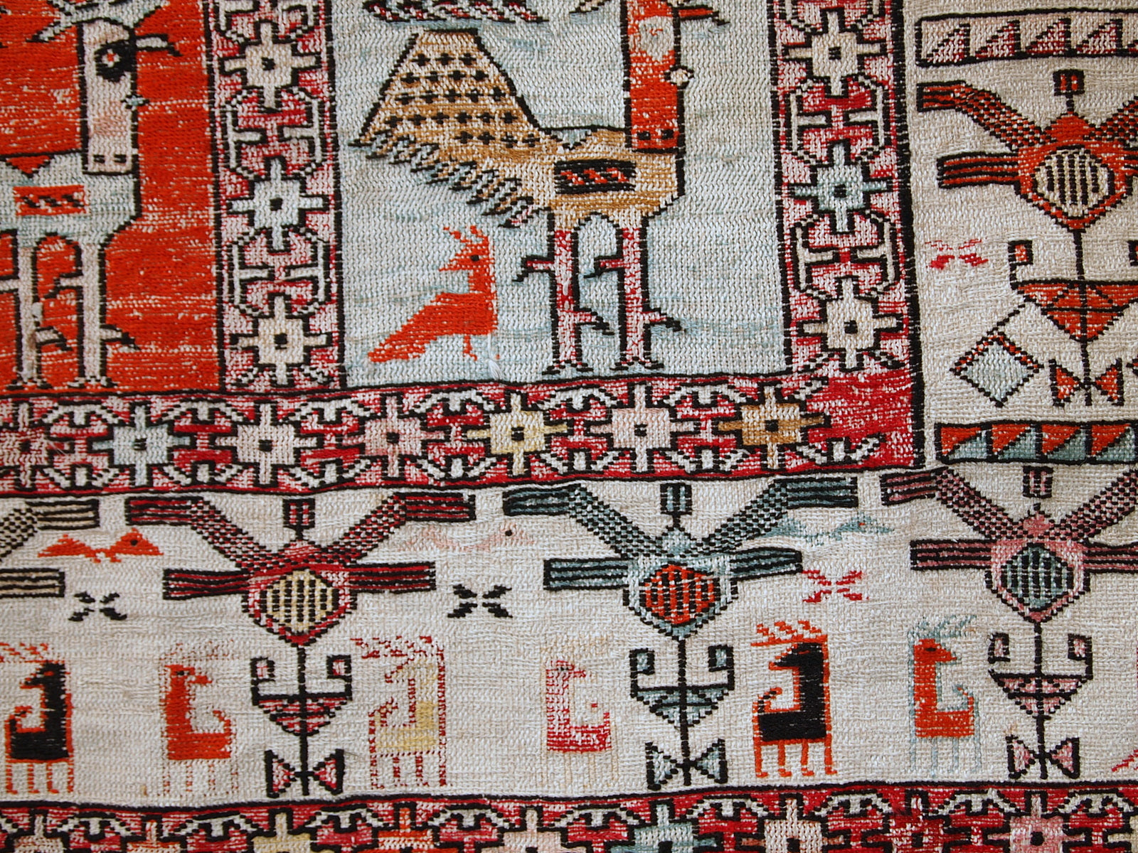 Vintage Persian flat-weave in original good condition. This kilim was made out of artificial silk on cotton base. It has very unusual design of repeated roosters in different shades. It has been made with an accent of warn effect, but it is actually in original good condition.
