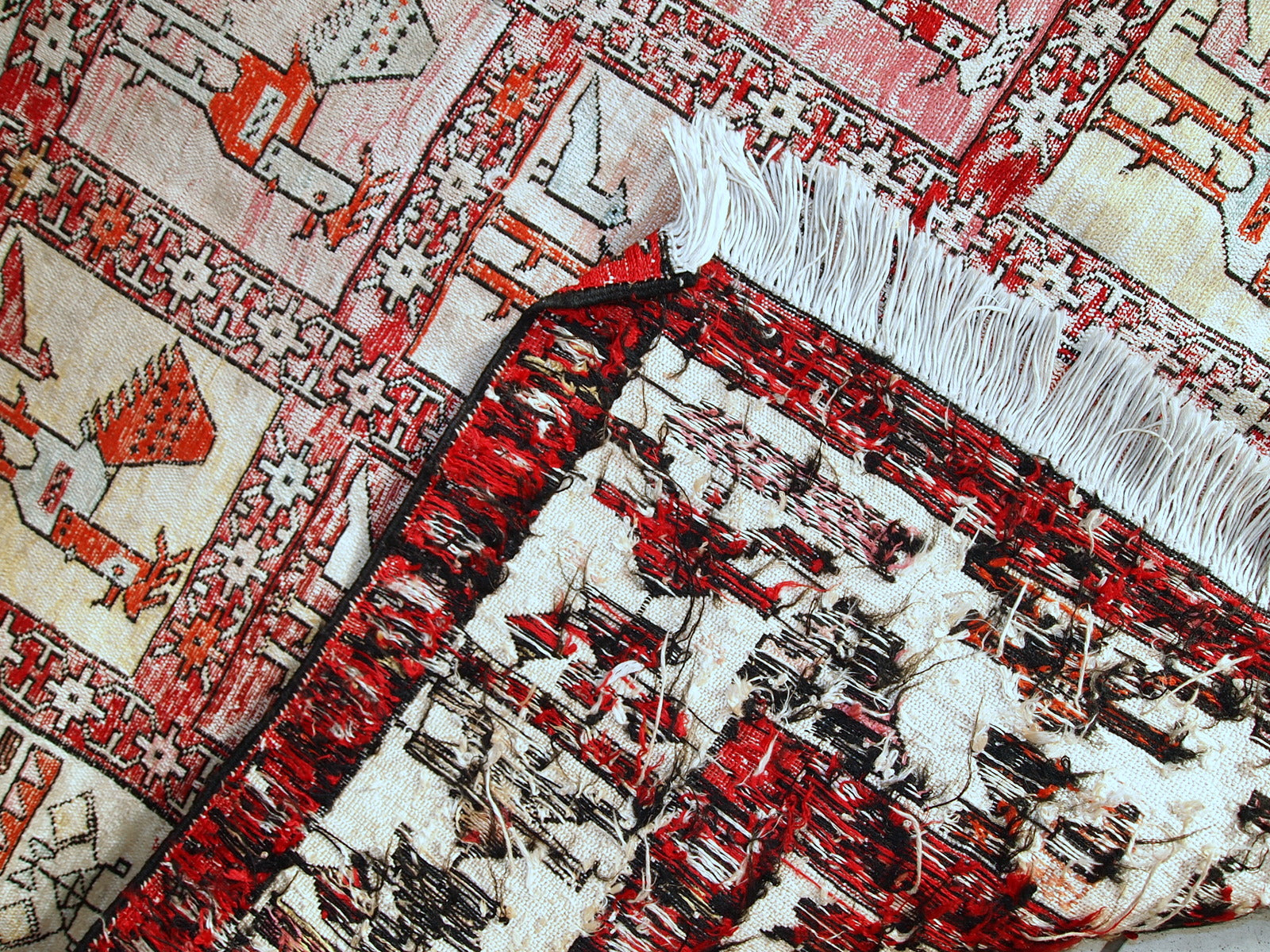Vintage Persian flat-weave in original good condition. This kilim was made out of artificial silk on cotton base. It has very unusual design of repeated roosters in different shades. It has been made with an accent of warn effect, but it is actually in original good condition.