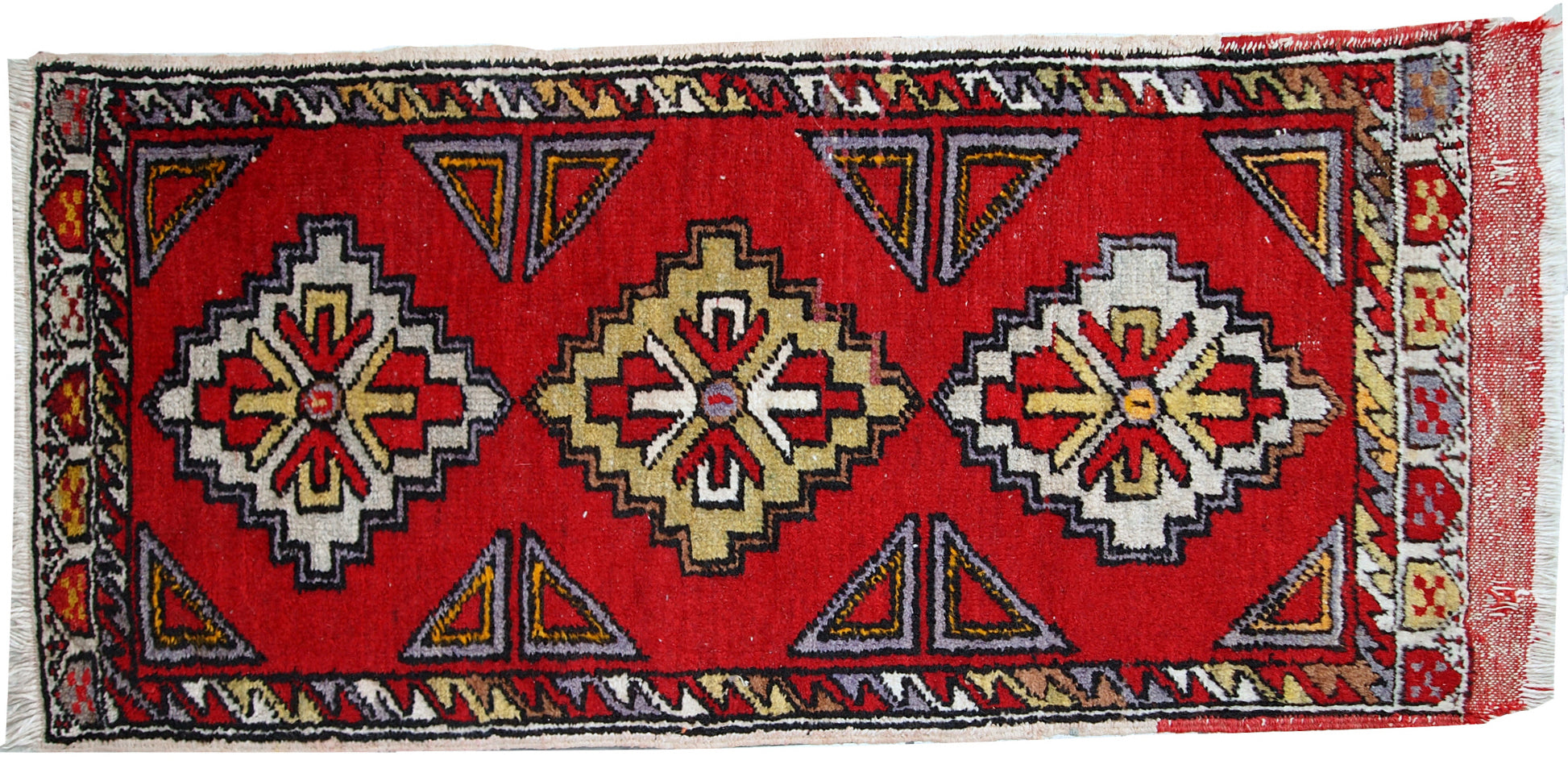 Vintage Turkish Yastik rug in original good condition. This rug made out of wool in bright red shade.