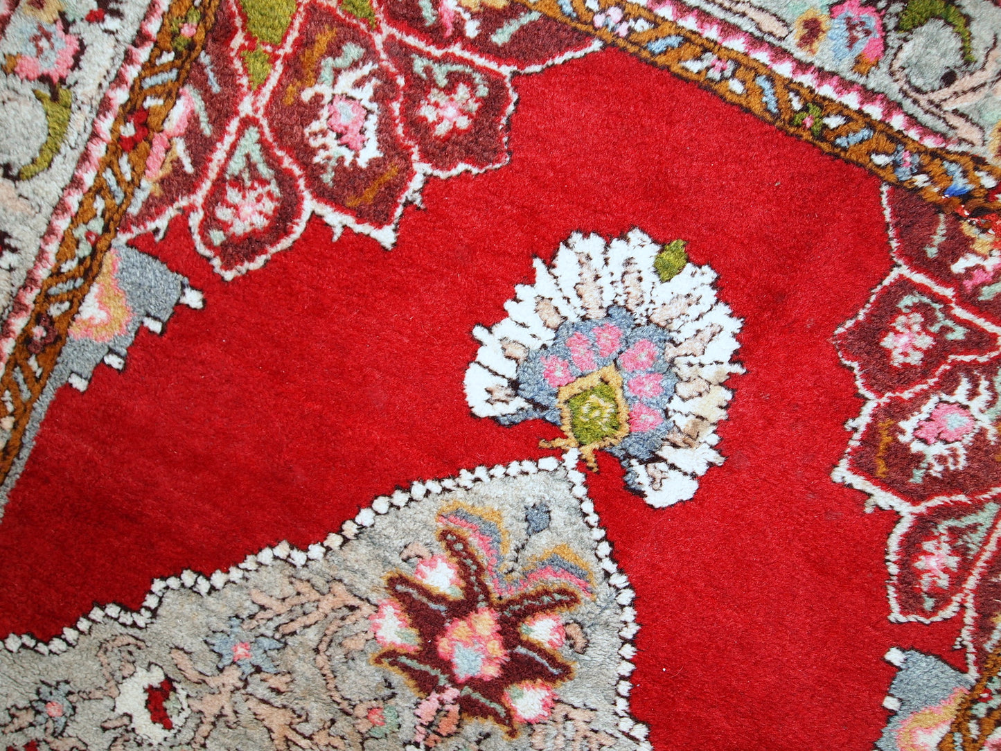 Vintage woolen Turkish Oushak runner in original good condition. It is in bright red shades with sky blue medallions. The wool is very soft.