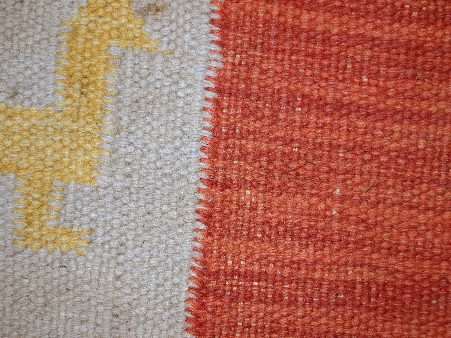 Vintage Persian kilim in bright shades of red, sky blue, beige and yellow. One side of the kilim has some age wear, but generally it is in original good condition.