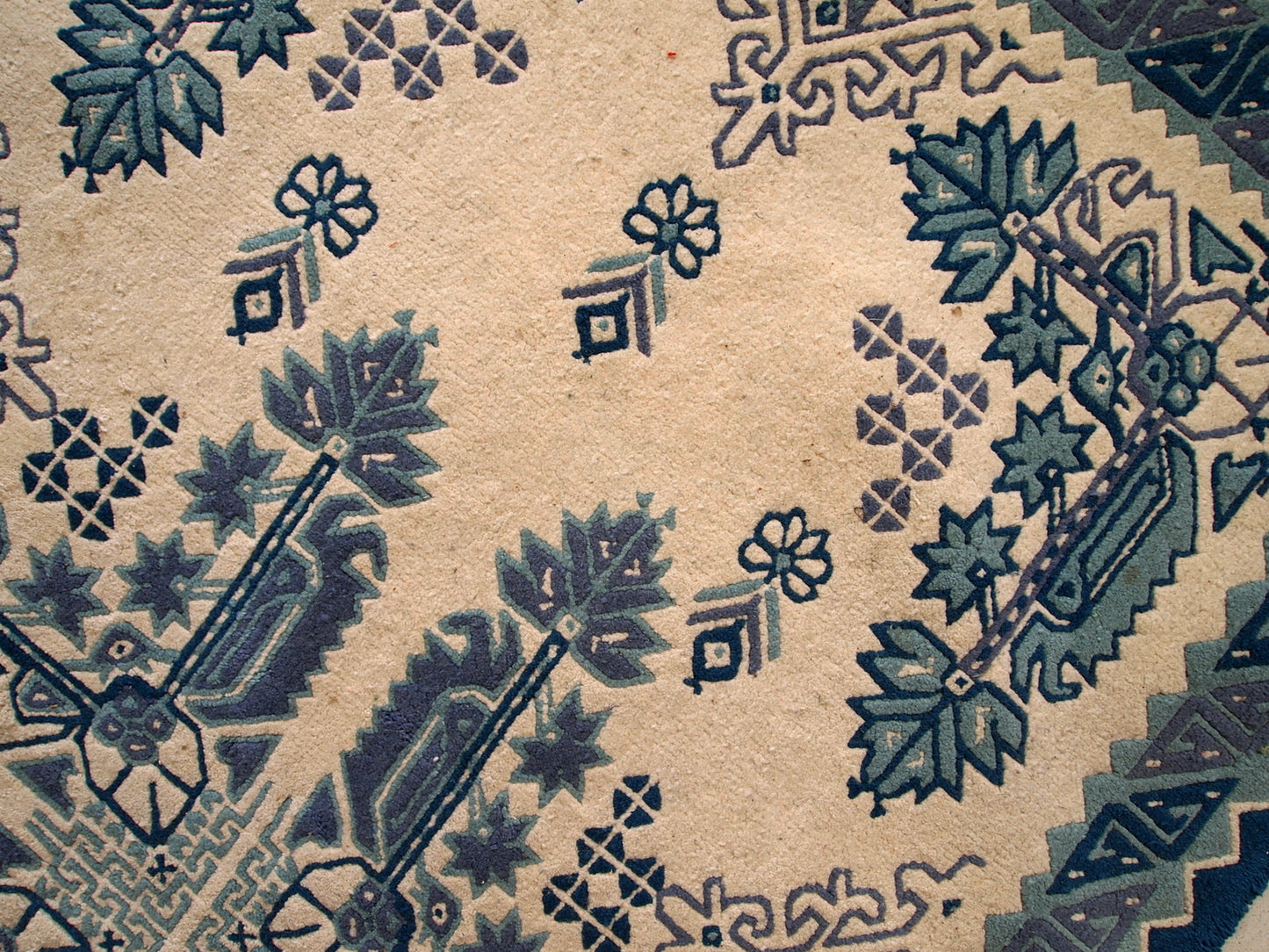Vintage Tunisian handmade rug in blue and white shades. The rug is from the middle of 20th century, made out of wool. It is in tribal design and in original good condition.