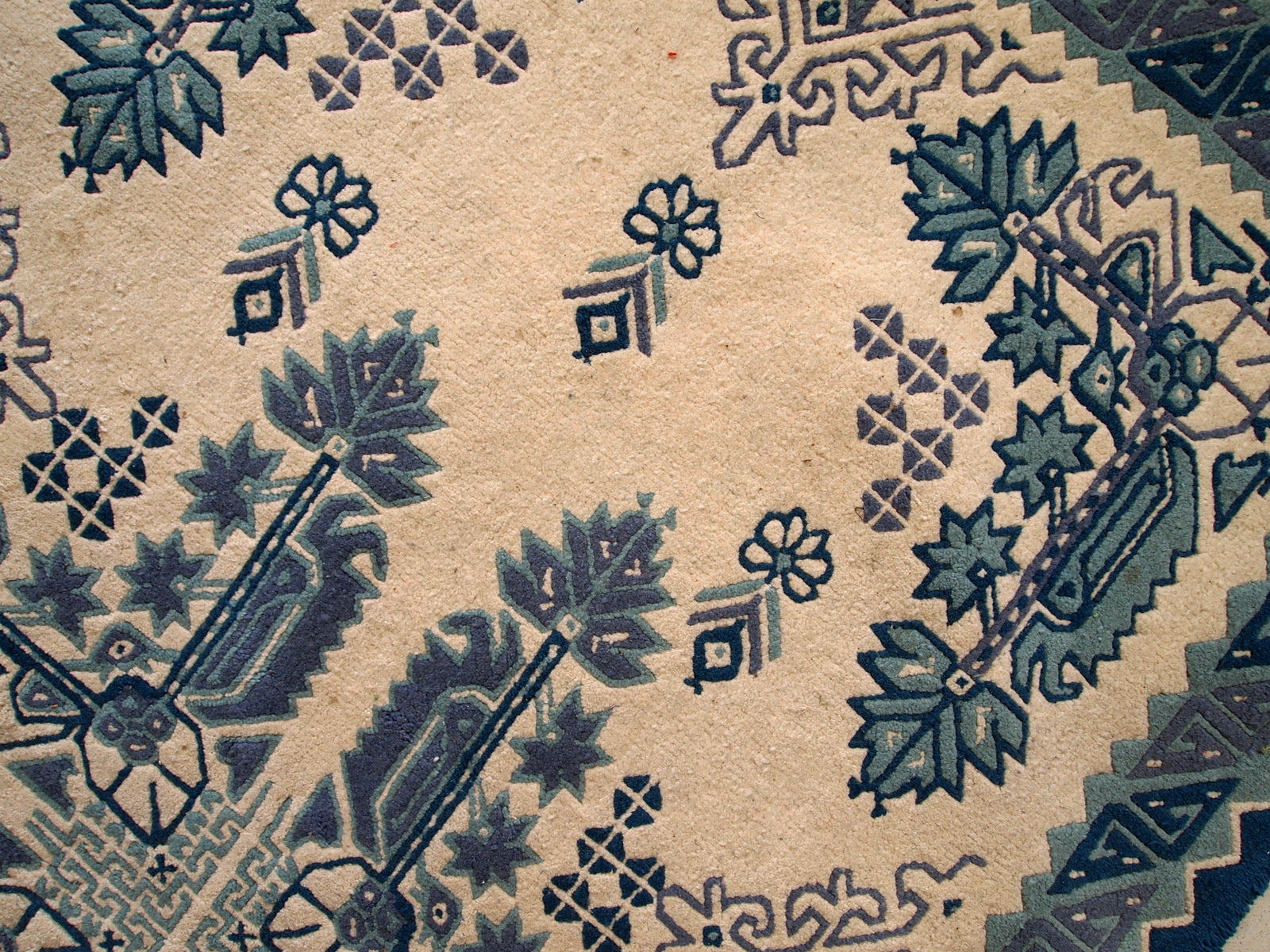 Vintage Tunisian handmade rug in blue and white shades. The rug is from the middle of 20th century, made out of wool. It is in tribal design and in original good condition.