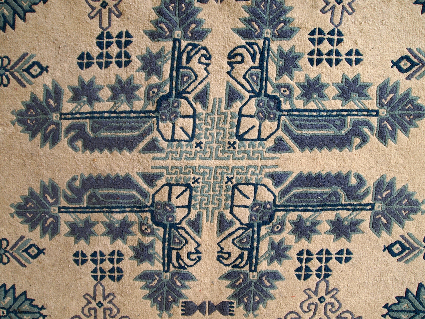Vintage Tunisian handmade rug in blue and white shades. The rug is from the middle of 20th century, made out of wool. It is in tribal design and in original good condition.