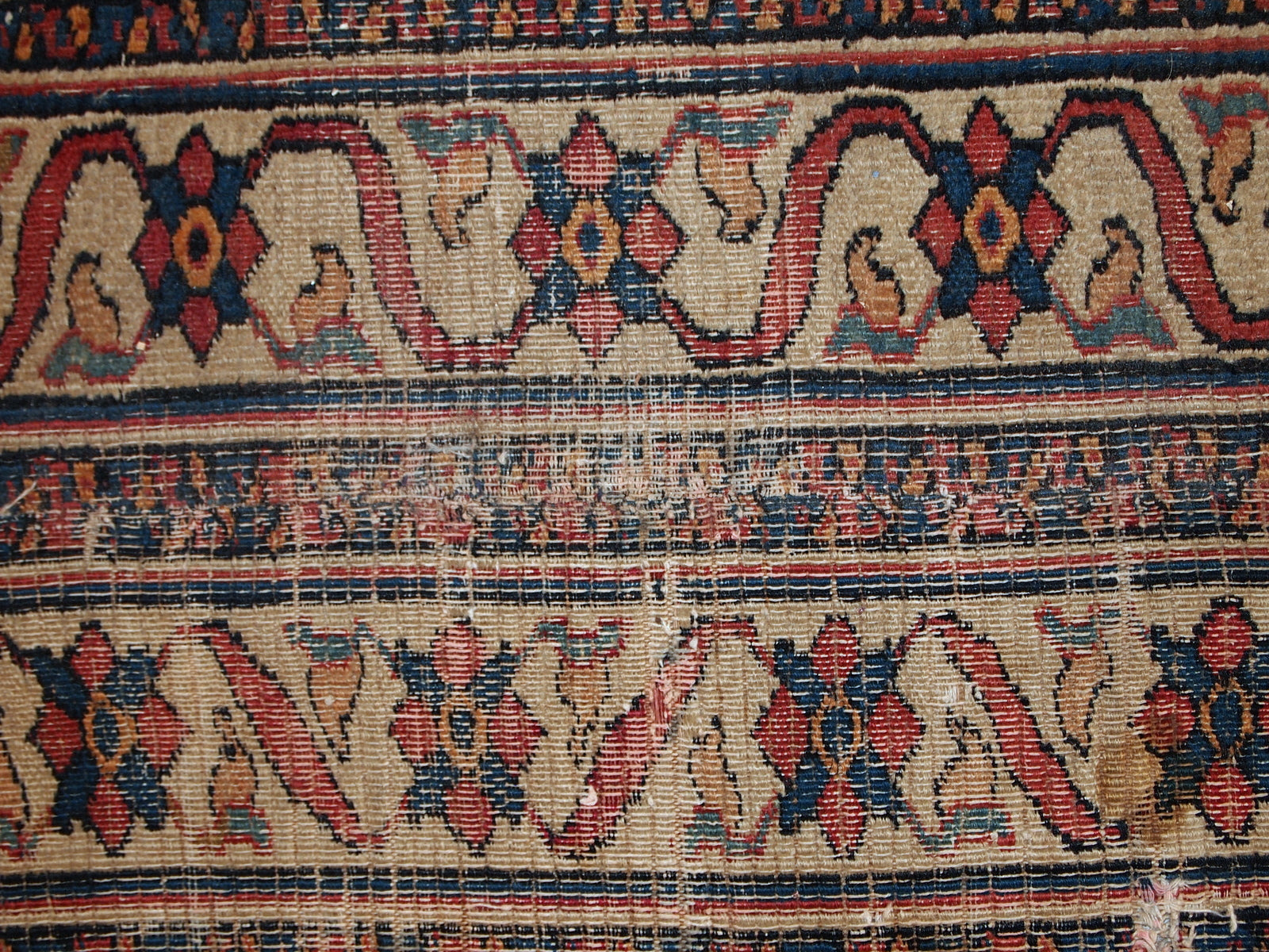Handmade antique Persian Mashad runner in original condition. All-over design, split in two parts. The shade of blue is changing from one side to another from darker to lighter. It is in distressed condition.