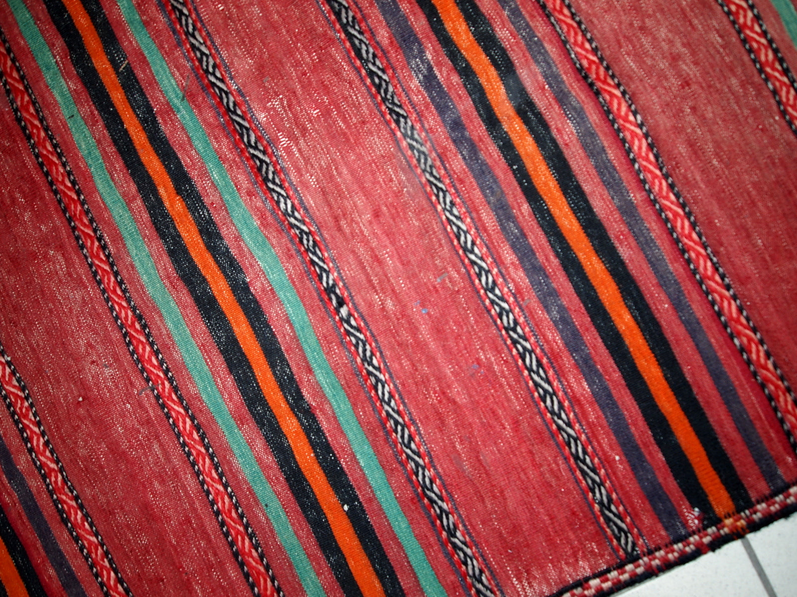 Handmade vintage Persian kilim in red shade with stripes. This kilim is in original condition, has some signs of age.