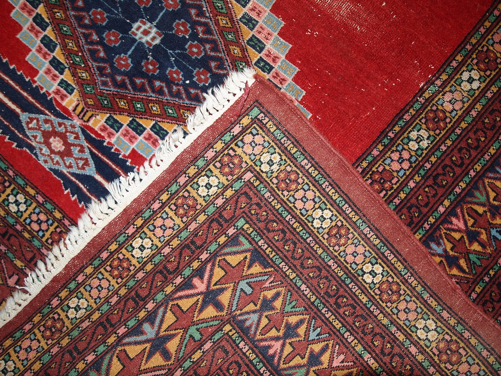 Handmade vintage distressed Uzbek Bukhara rug, 1960s
