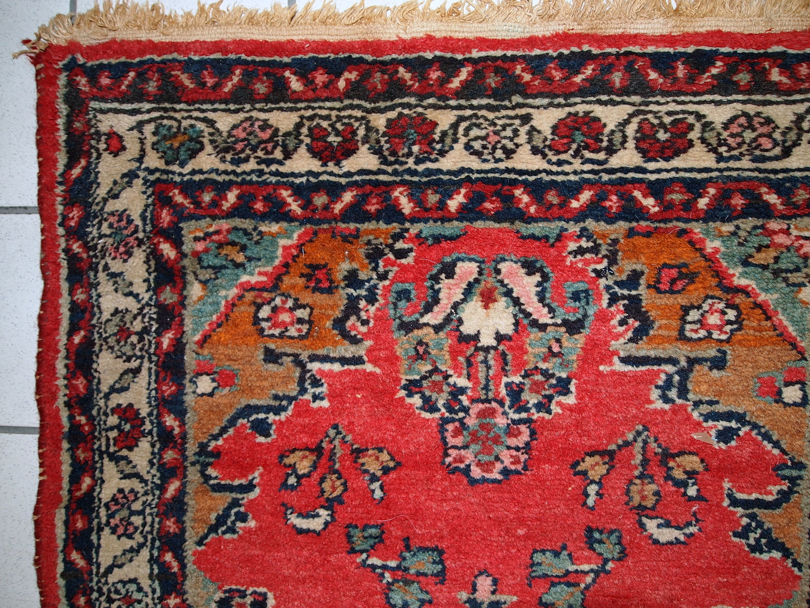 Handmade vintage Hamadan runner in red wool. This rug has been made in the middle of 20th century in Middle East region.