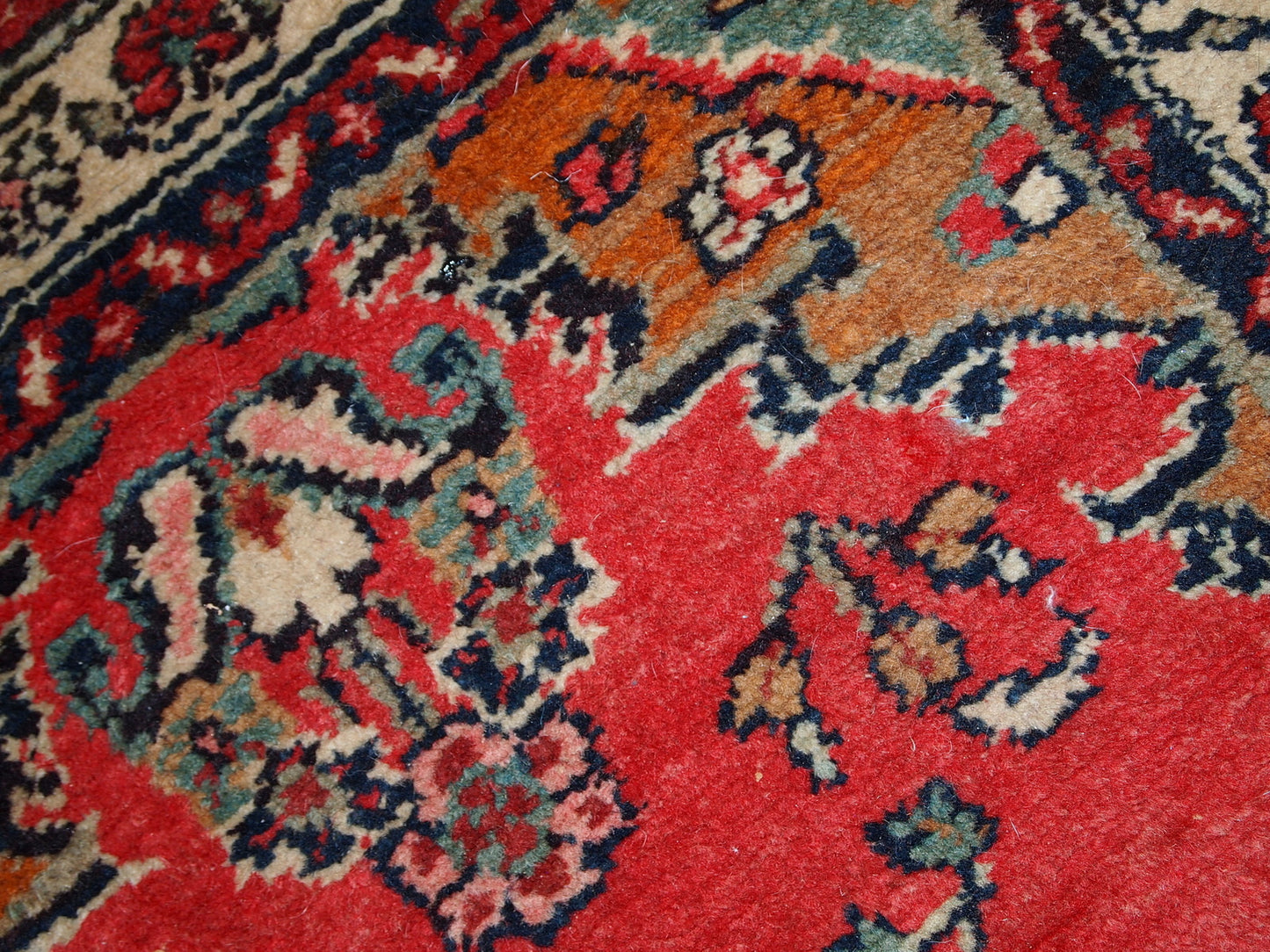Handmade vintage Hamadan runner in red wool. This rug has been made in the middle of 20th century in Middle East region.