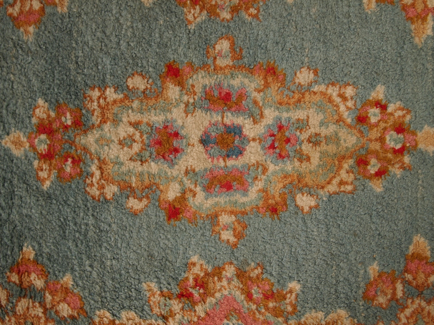 Handmade vintage rug from Middle East in sky blue color. It is in original good condition from the end of 20th century.