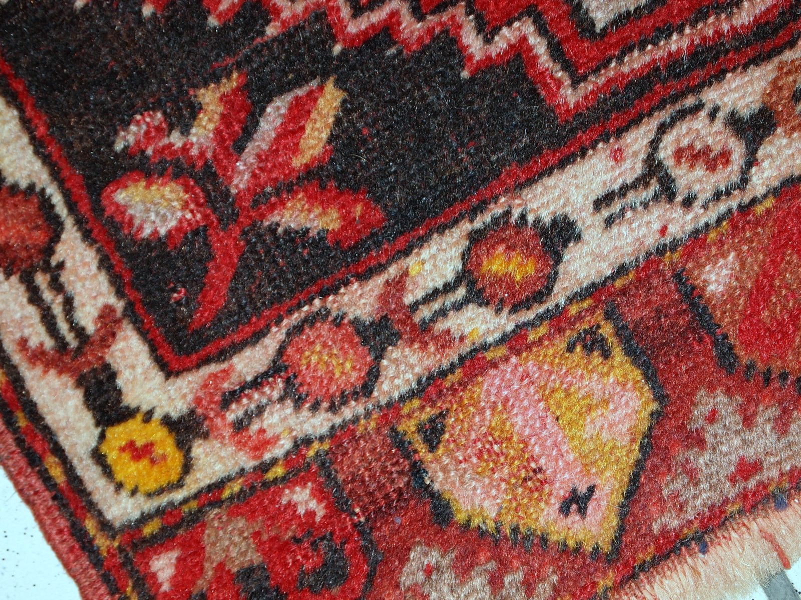 Handmade vintage Turkish Yastik rug in bright red colour. The rug is in original good condition from the middle of 20th century.