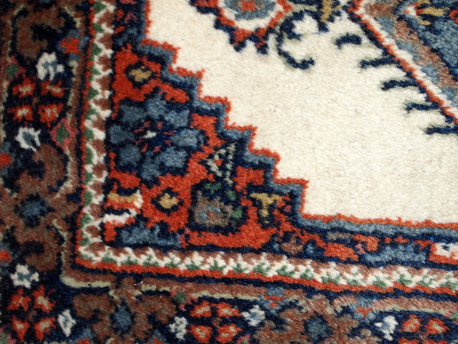 Handmade vintage Hamadan rug in white, red and olive shades. The rug is in original good condition from the end of 20th century.
