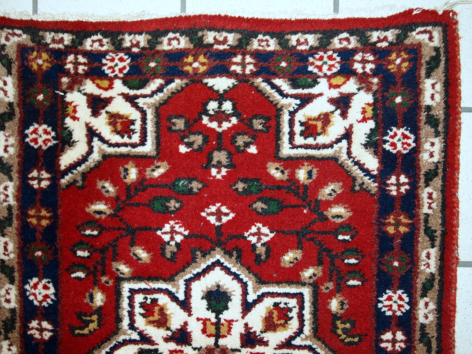 Handmade vintage Hamadan rug in bright red shade. The rug is in original good condition from the end of 20th century.