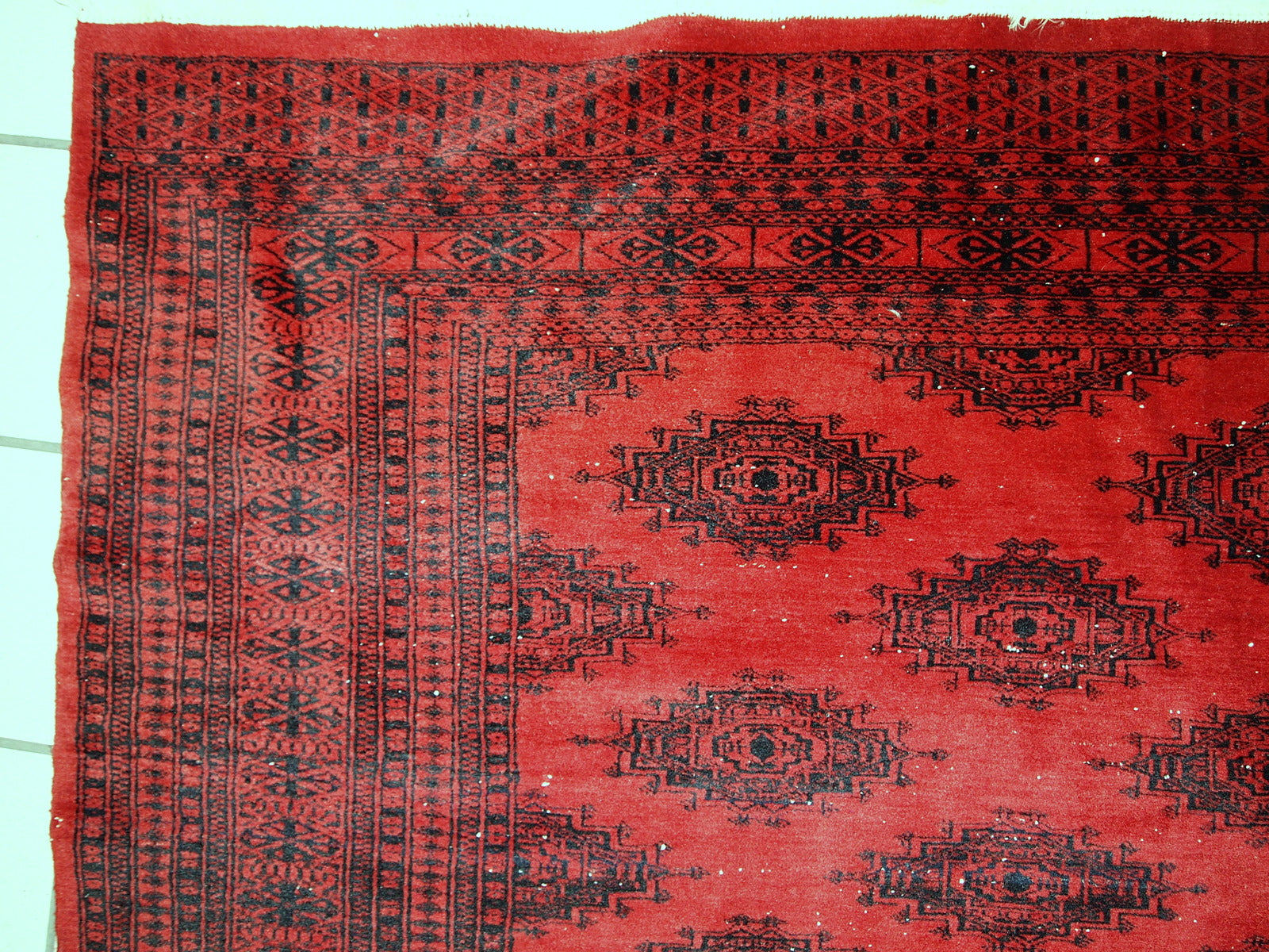 Handmade vintage rug from Afghanistan from the end of 20th century. The rug is in original condition, it has one patch. 