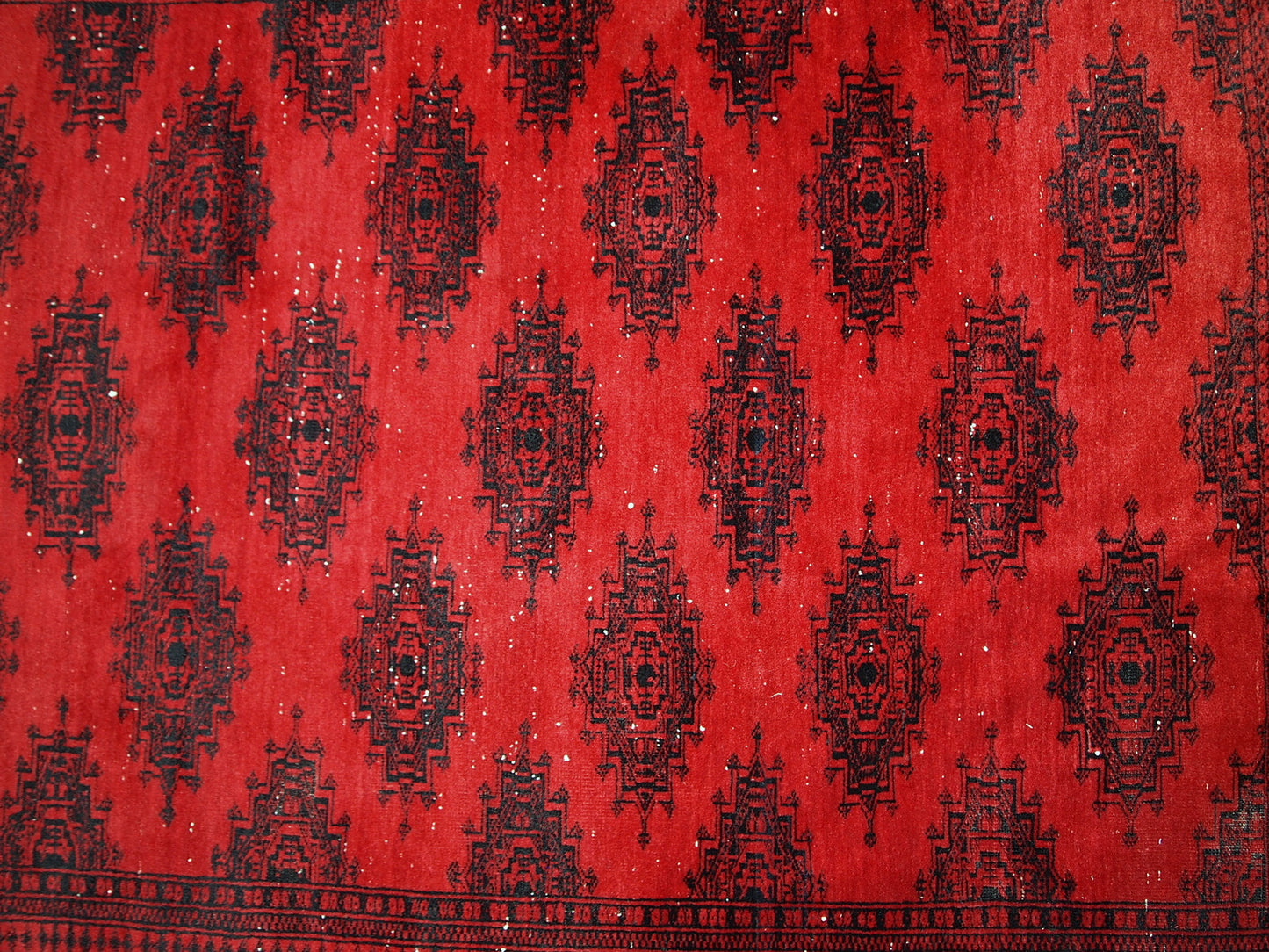 Handmade vintage rug from Afghanistan from the end of 20th century. The rug is in original condition, it has one patch. 