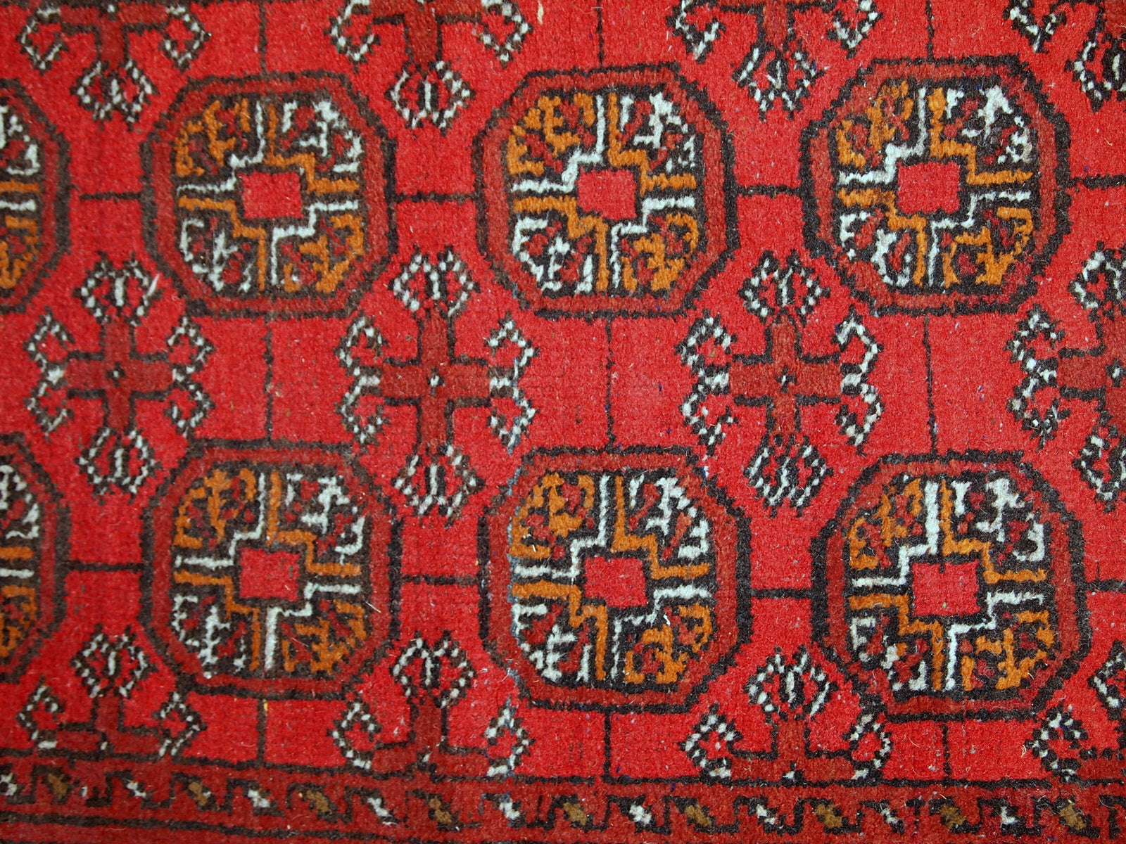 Handmade vintage Afghan Ersari rug from the middle of 20th century. It is in original good condition made in wool.