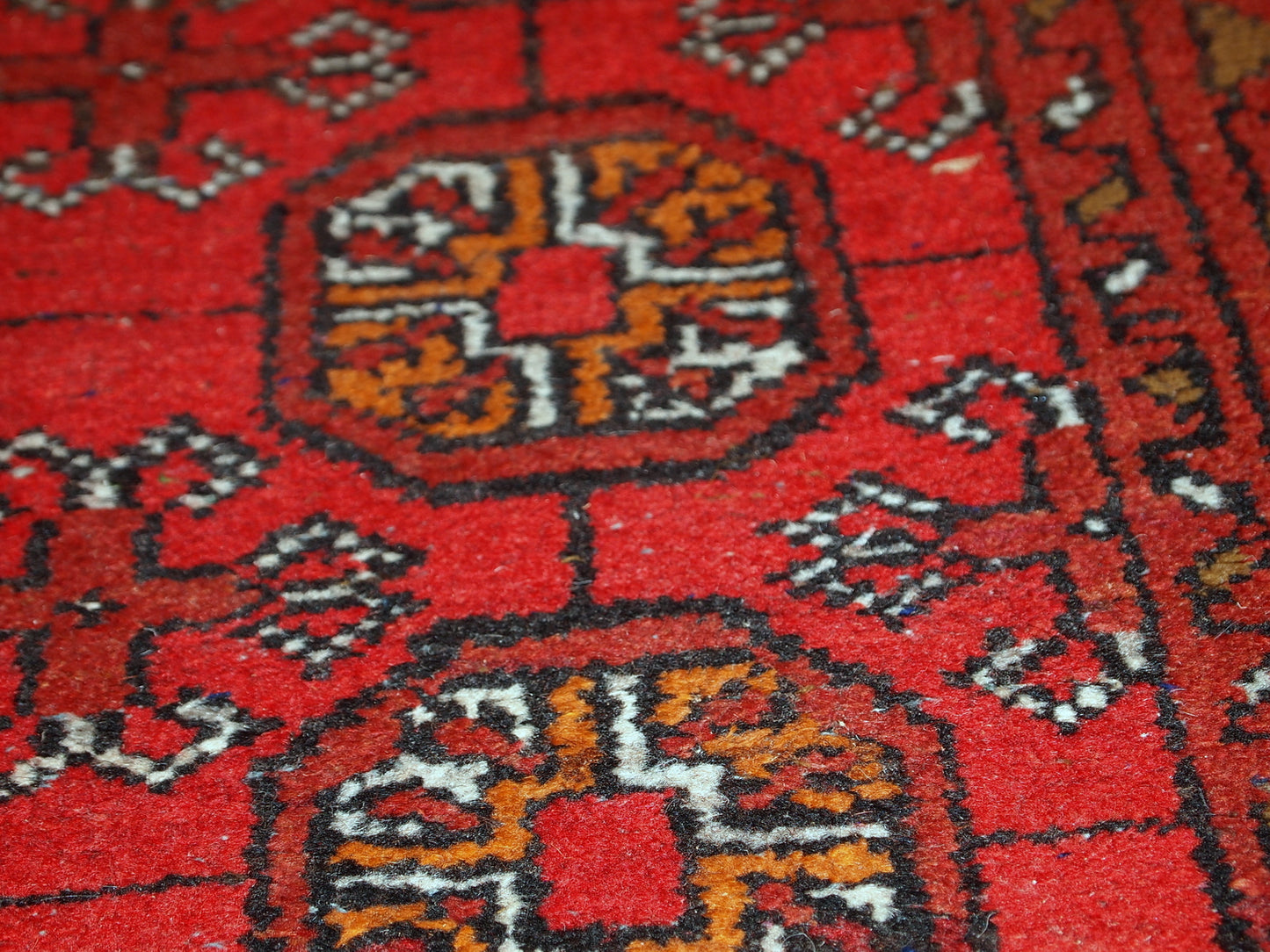 Handmade vintage Afghan Ersari rug from the middle of 20th century. It is in original good condition made in wool.