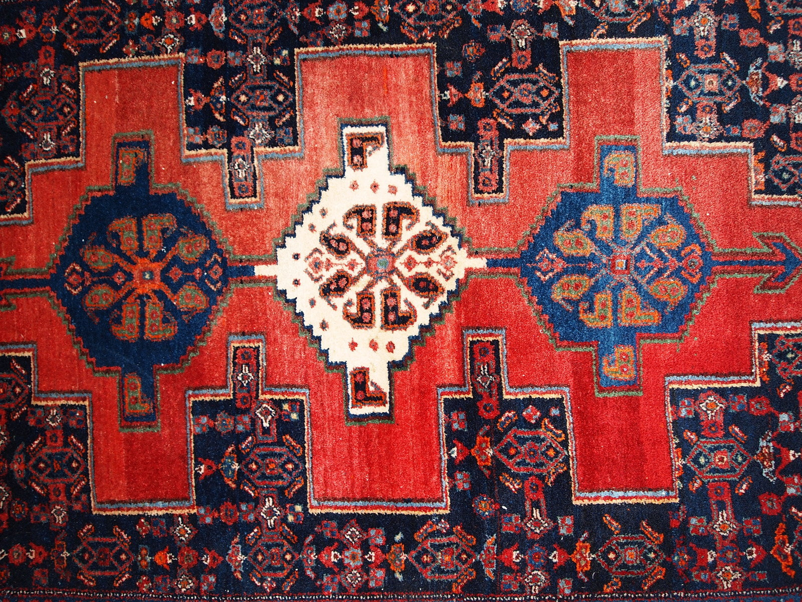 Handmade vintage Persian Senneh rug in original good condition. The rug is from the middle of 20th century, made in wool.