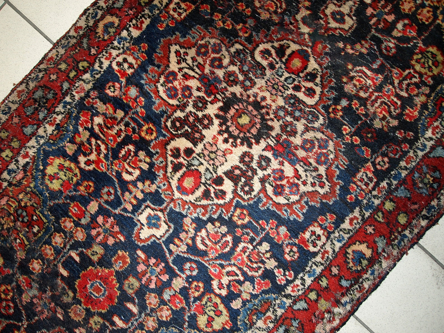 Handmade antique Persian Malayer runner in original good condition. The rug is from the beginning of 20th century, made in wool.