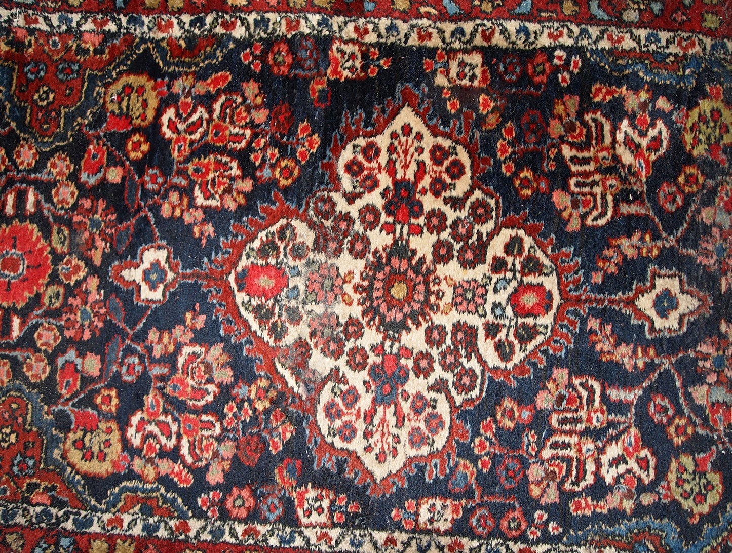 Handmade antique Persian Malayer runner in original good condition. The rug is from the beginning of 20th century, made in wool.