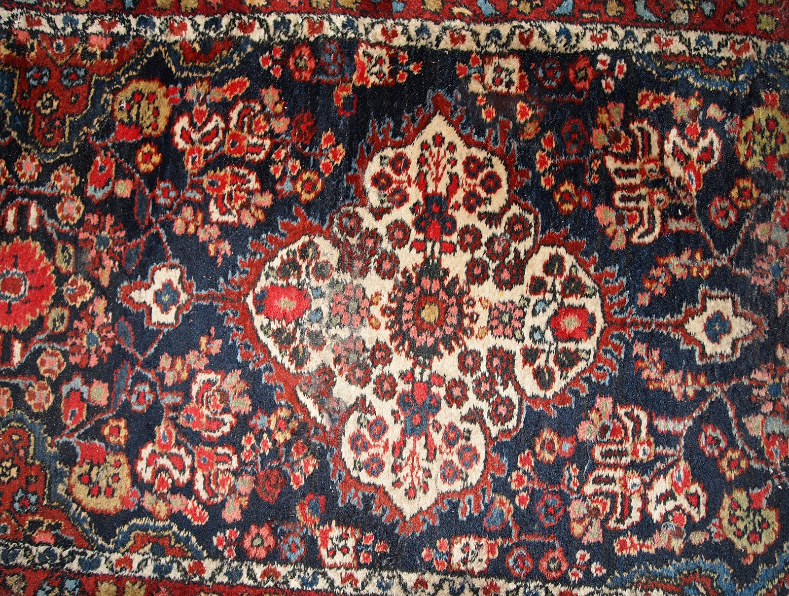 Handmade antique Persian Malayer runner in original good condition. The rug is from the beginning of 20th century, made in wool.