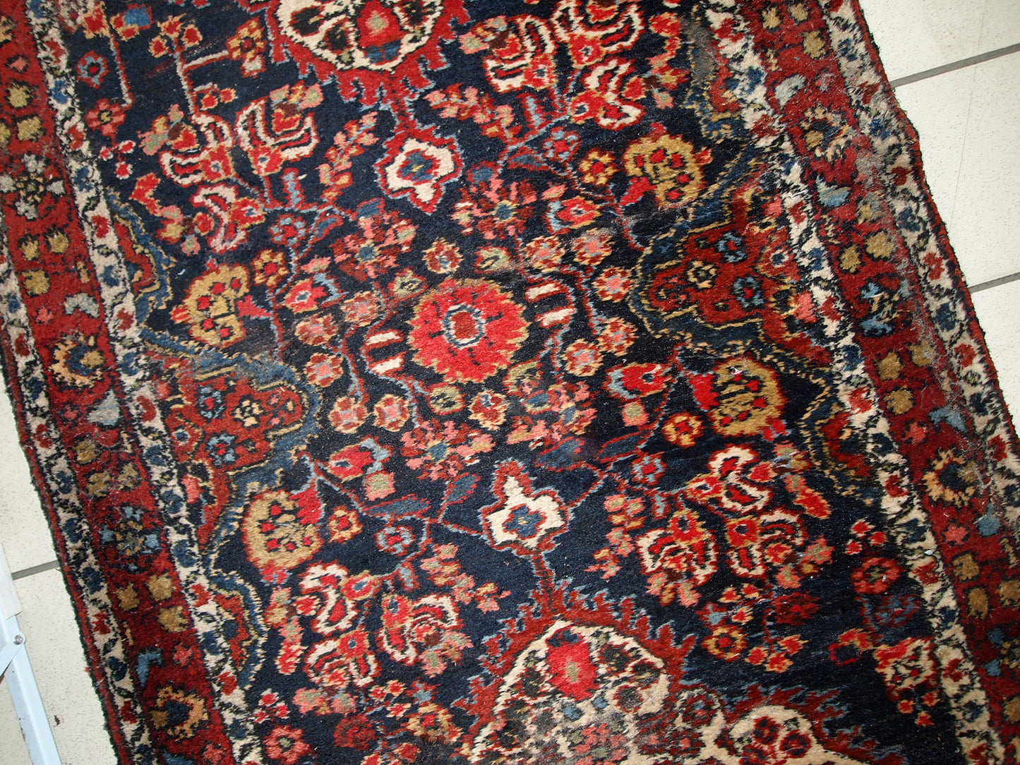 Handmade antique Persian Malayer runner in original good condition. The rug is from the beginning of 20th century, made in wool.