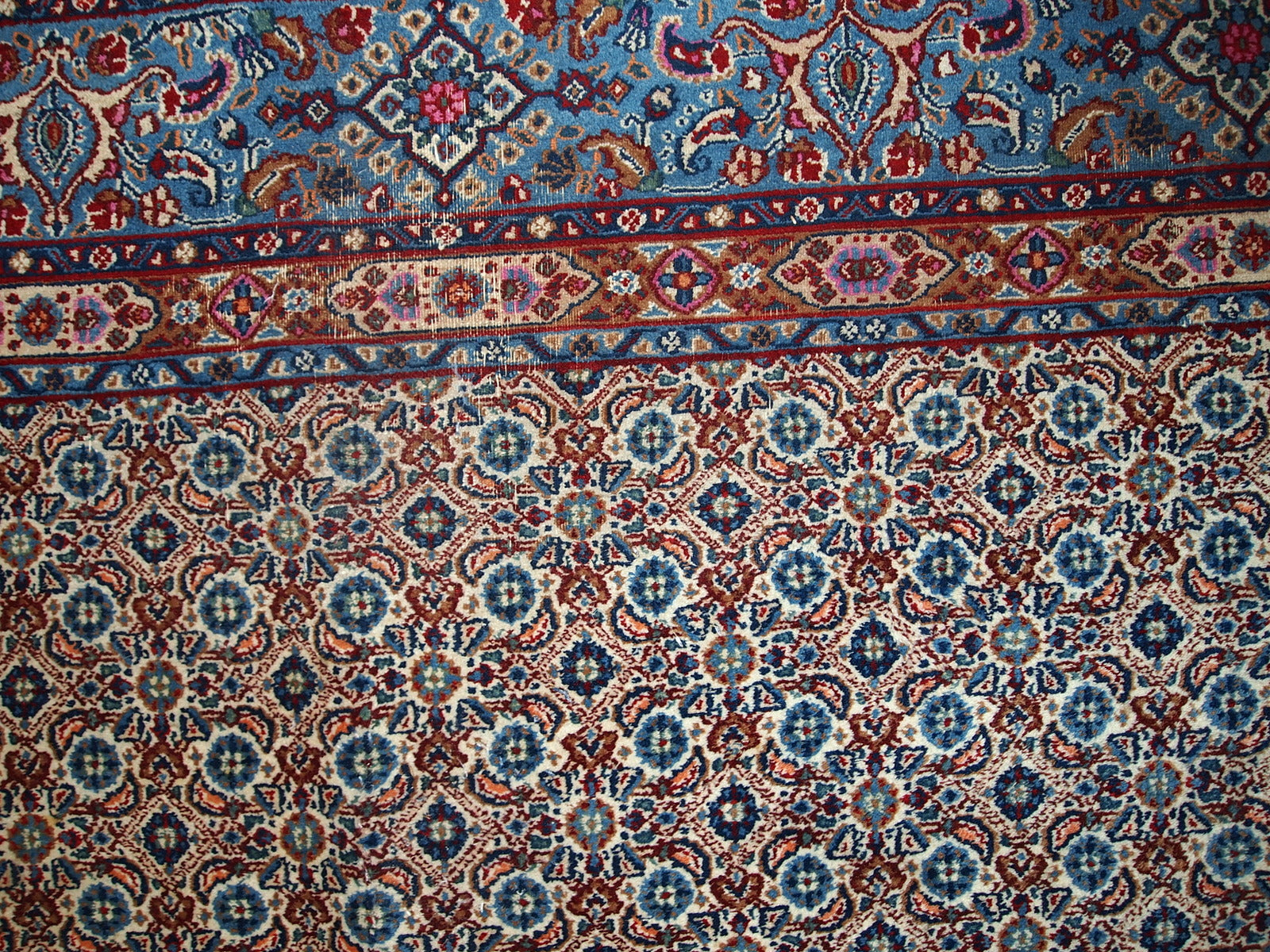 Handmade vintage Persian Nain rug in original good condition, it has some low pile. The rug is from the end of 20th century made in squarish shape.