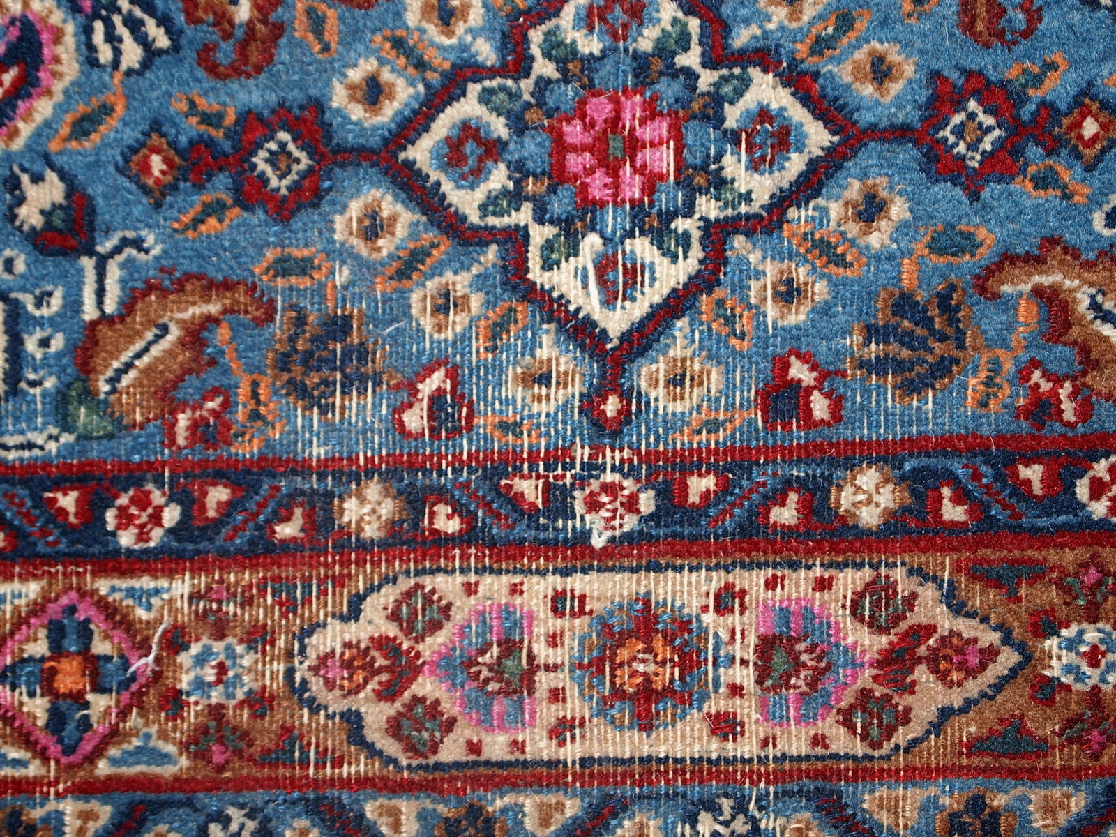 Handmade vintage Persian Nain rug in original good condition, it has some low pile. The rug is from the end of 20th century made in squarish shape.