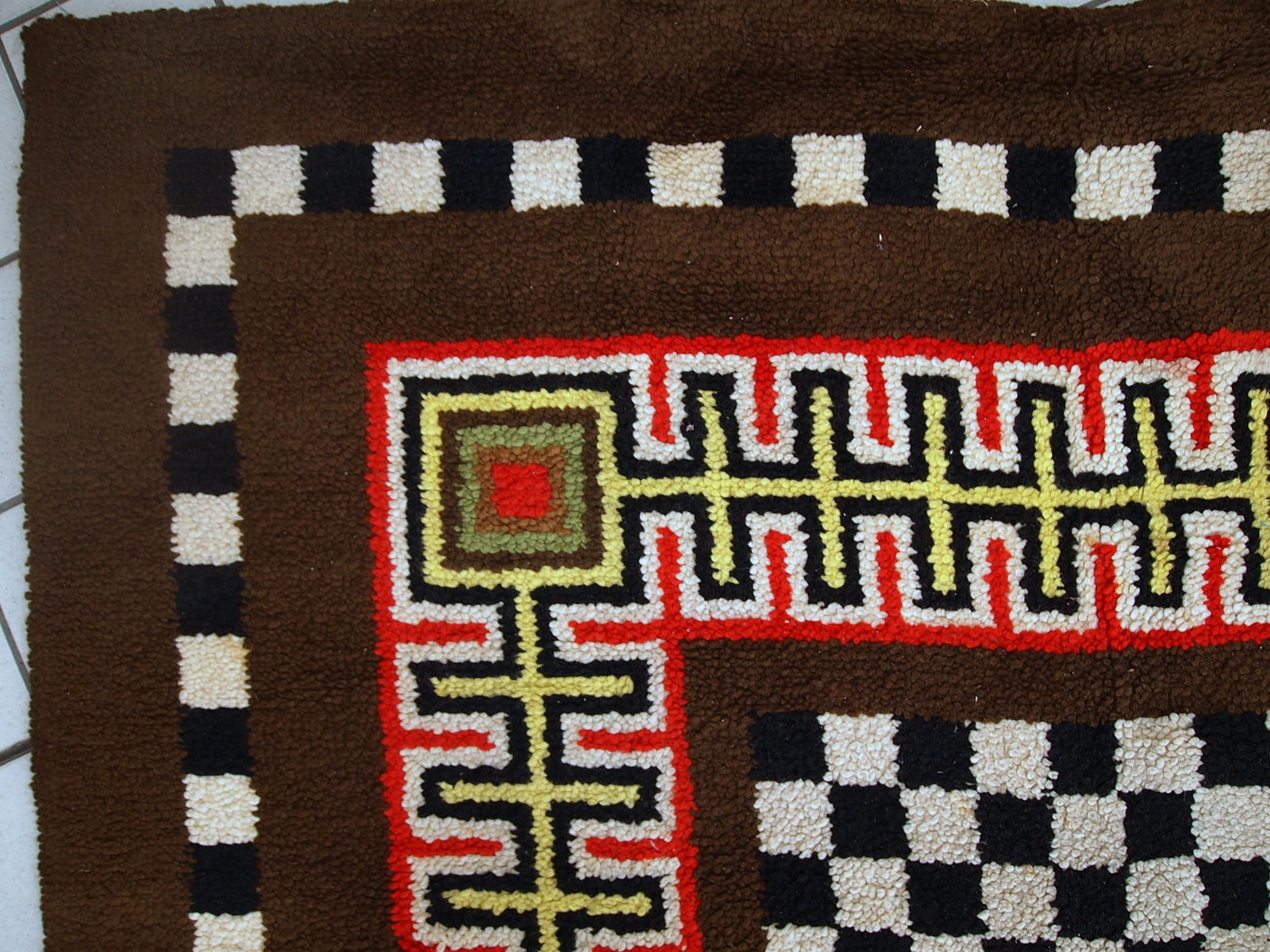Handmade vintage French modern rug in original good condition. The rug is from the middle of 20th century made in wool.