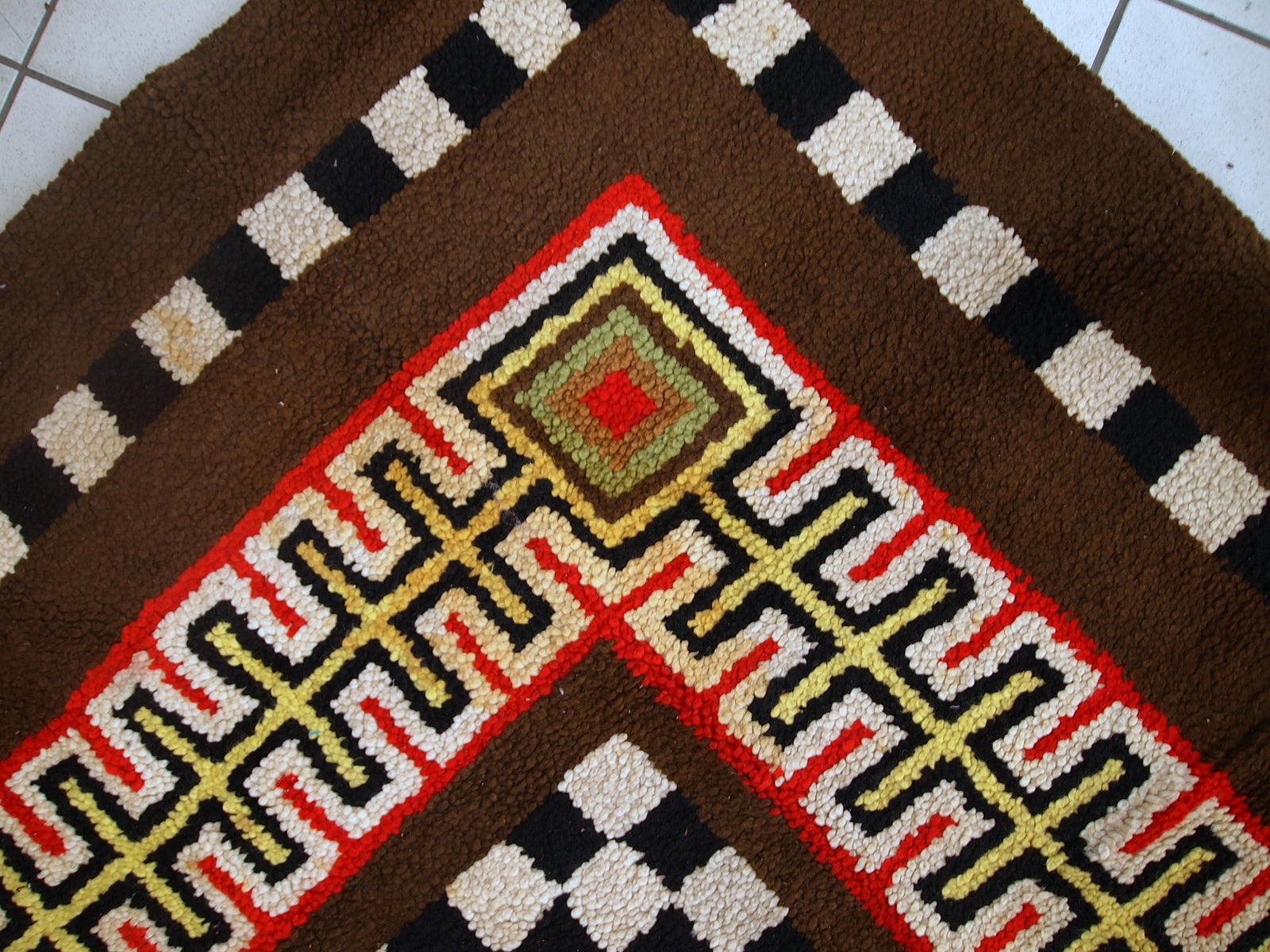 Handmade vintage French modern rug in original good condition. The rug is from the middle of 20th century made in wool.