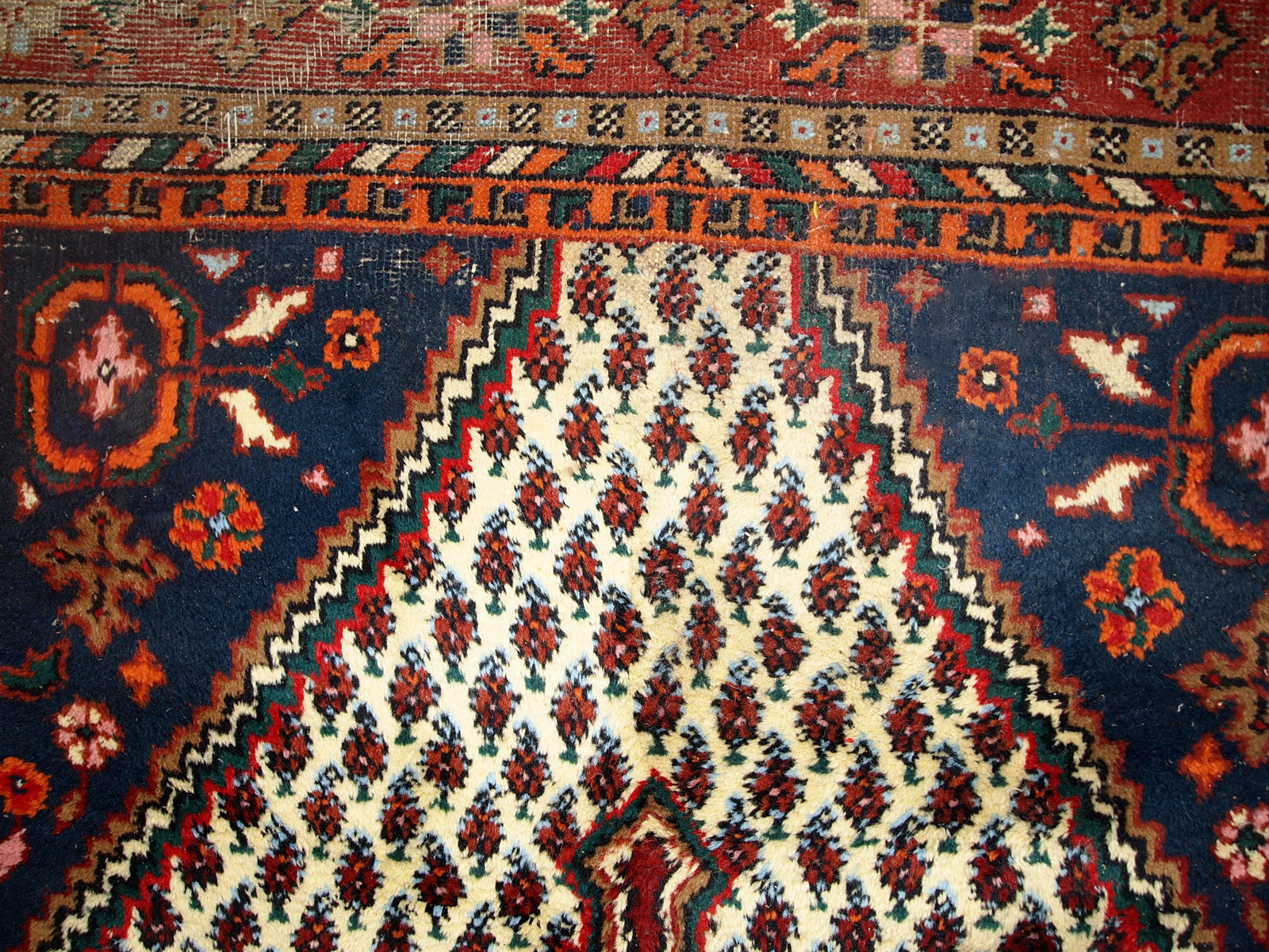 Handmade vintage Hamadan rug in distressed condition ( it has some areas with low pile). The rug is from the end of 20th century made in wool.