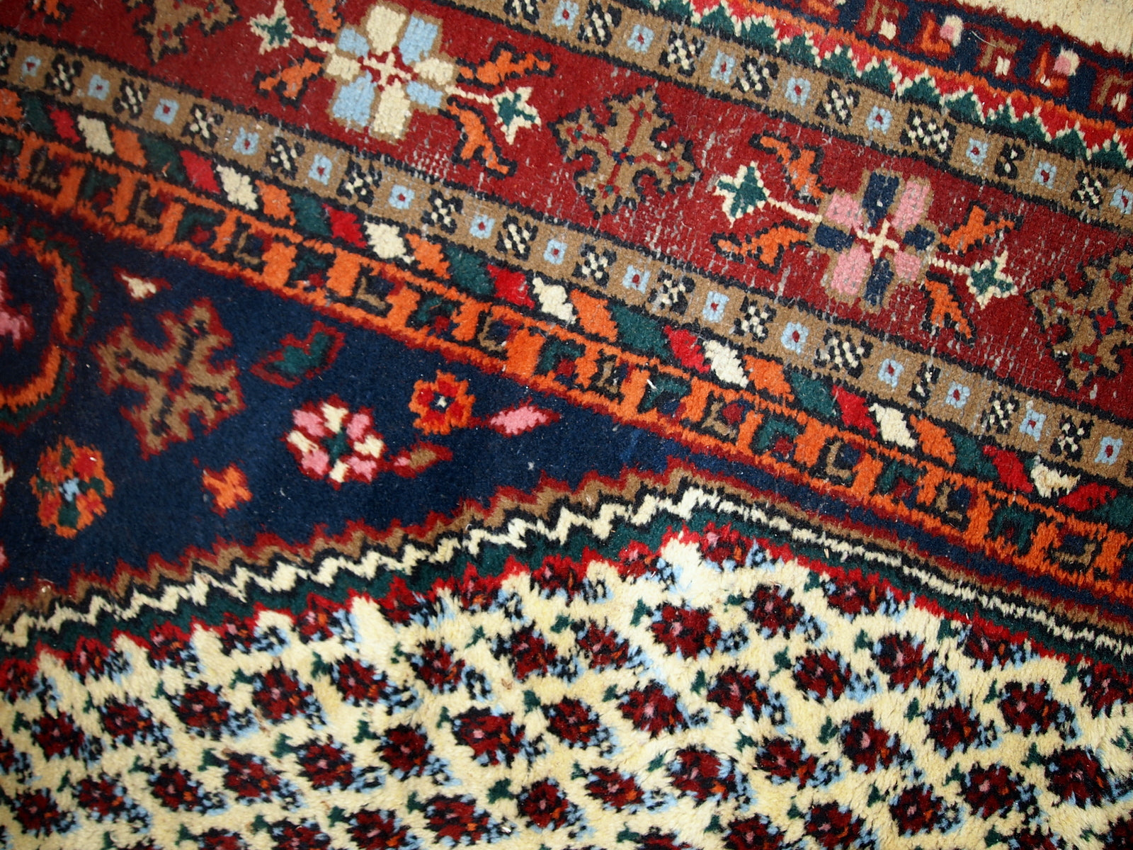 Handmade vintage Hamadan rug in distressed condition ( it has some areas with low pile). The rug is from the end of 20th century made in wool.