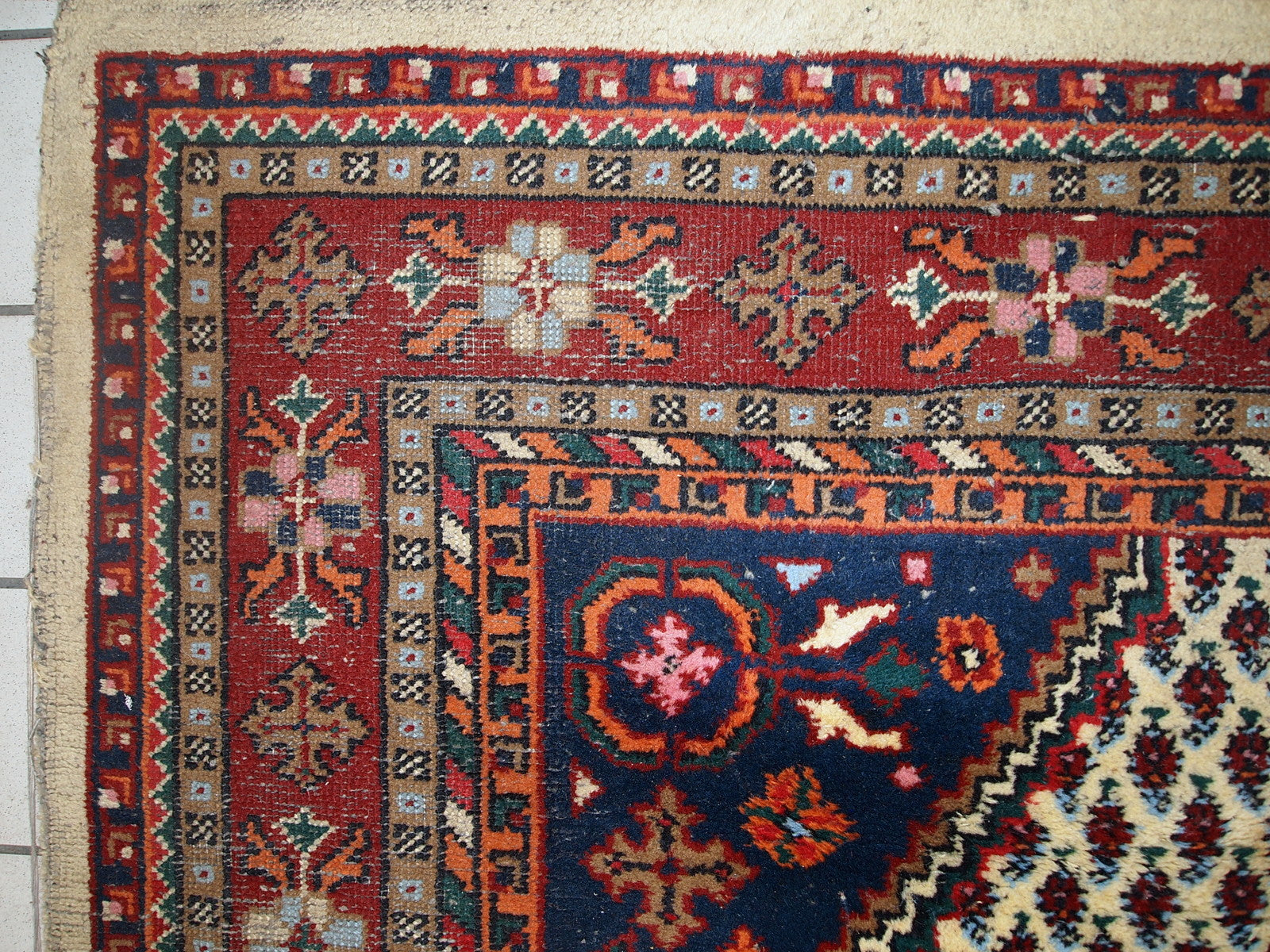 Handmade vintage Hamadan rug in distressed condition ( it has some areas with low pile). The rug is from the end of 20th century made in wool.