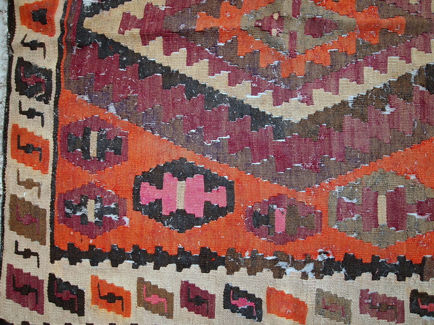 Handmade antique flat-weave from Afghanistan in distressed condition. The rug is from the beginning of 20th century.