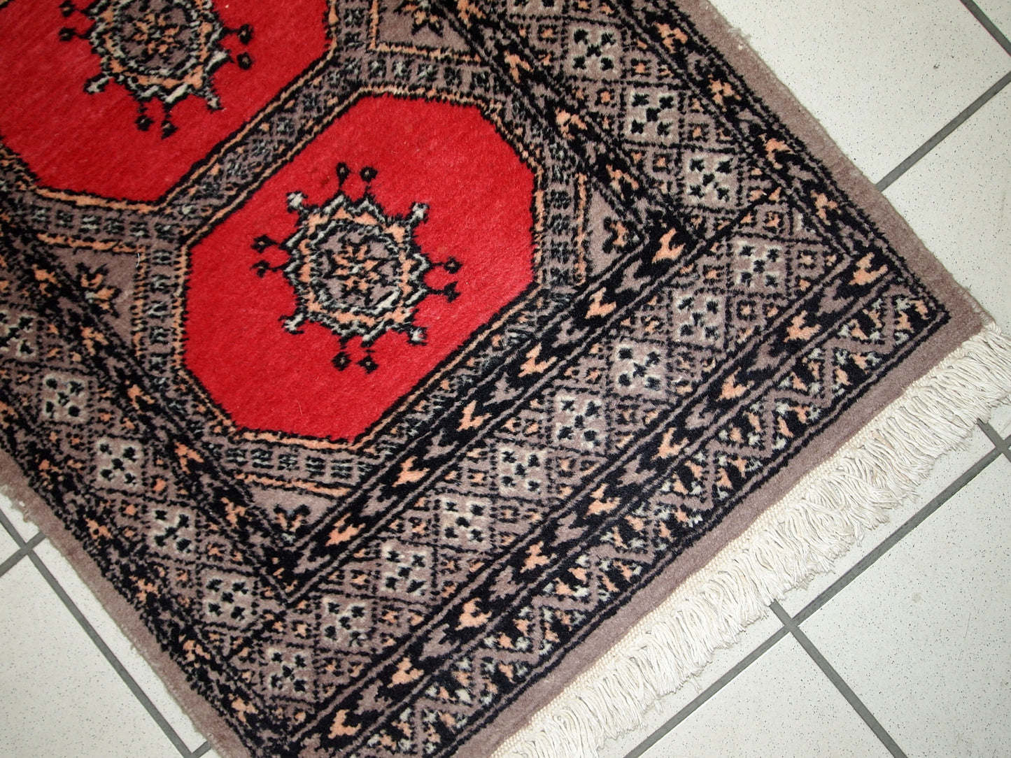 Handmade vintage Uzbek Bukhara rug, 1960s