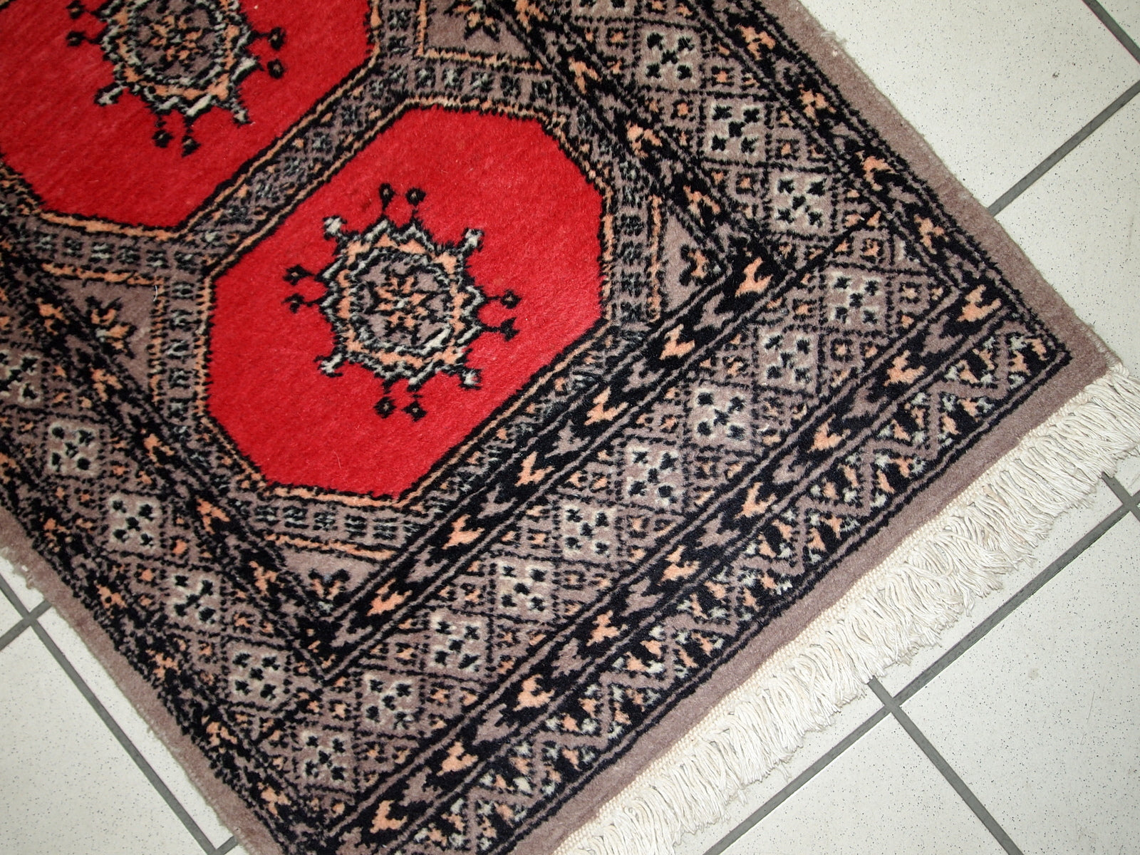 Handmade vintage Uzbek Bukhara rug, 1960s