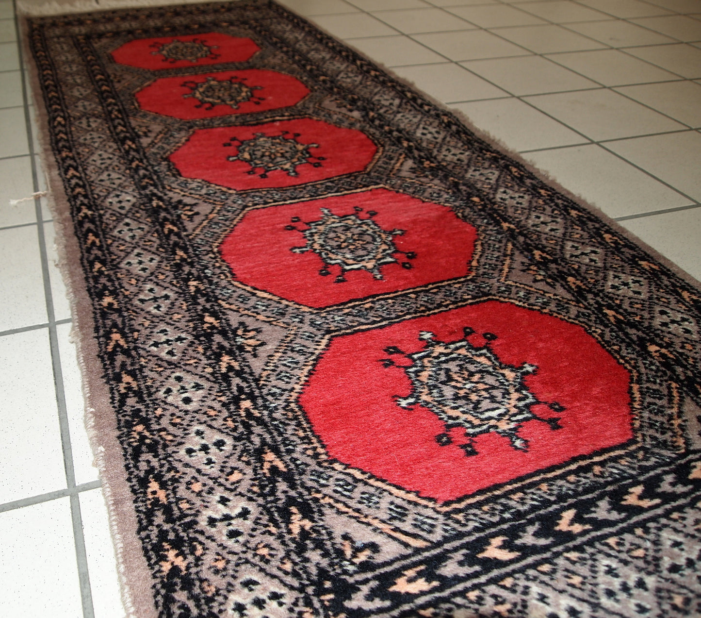 Handmade vintage Uzbek Bukhara rug, 1960s