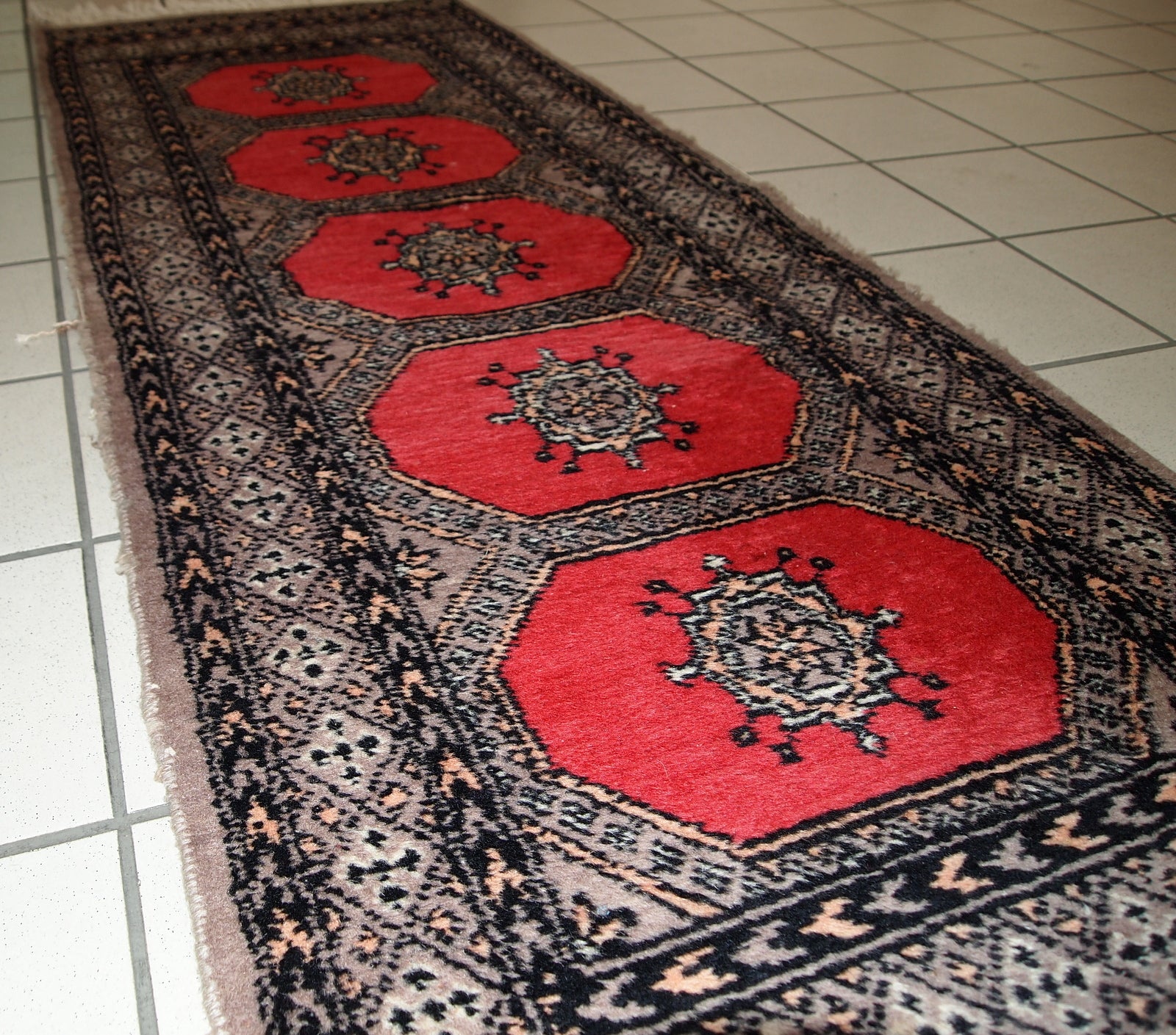 Handmade vintage Uzbek Bukhara rug, 1960s