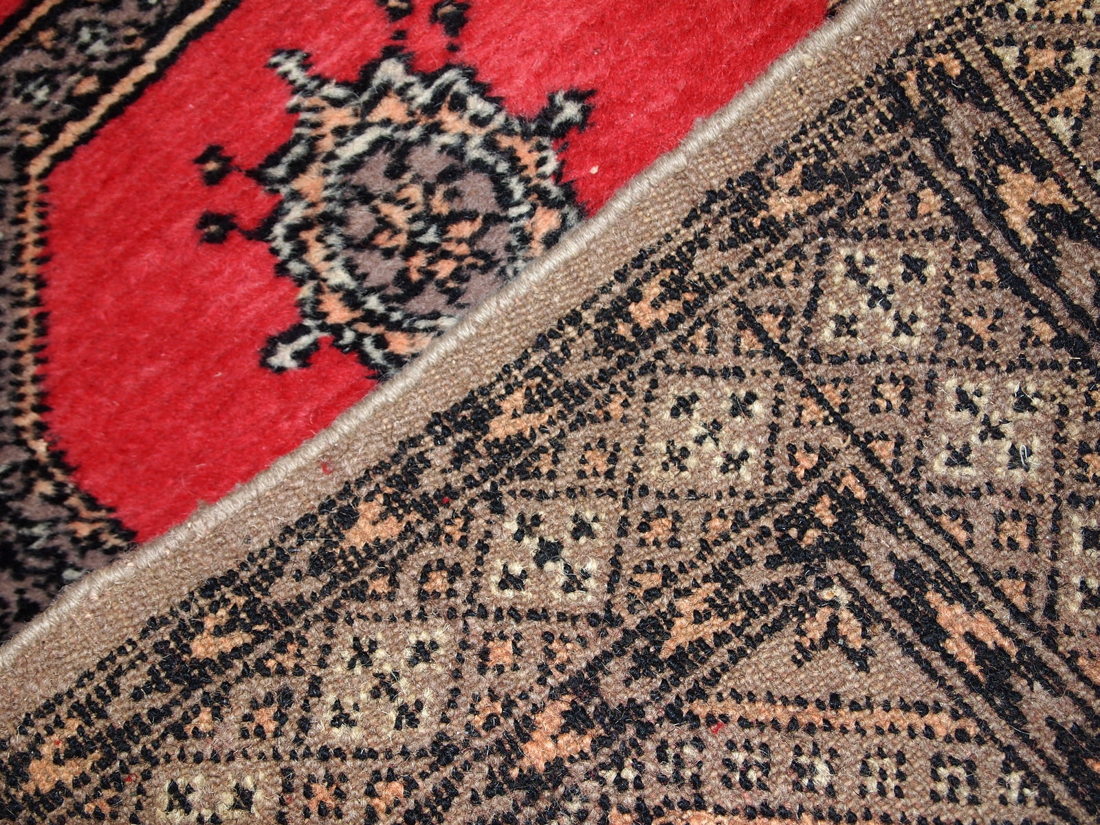 Handmade vintage Uzbek Bukhara rug, 1960s