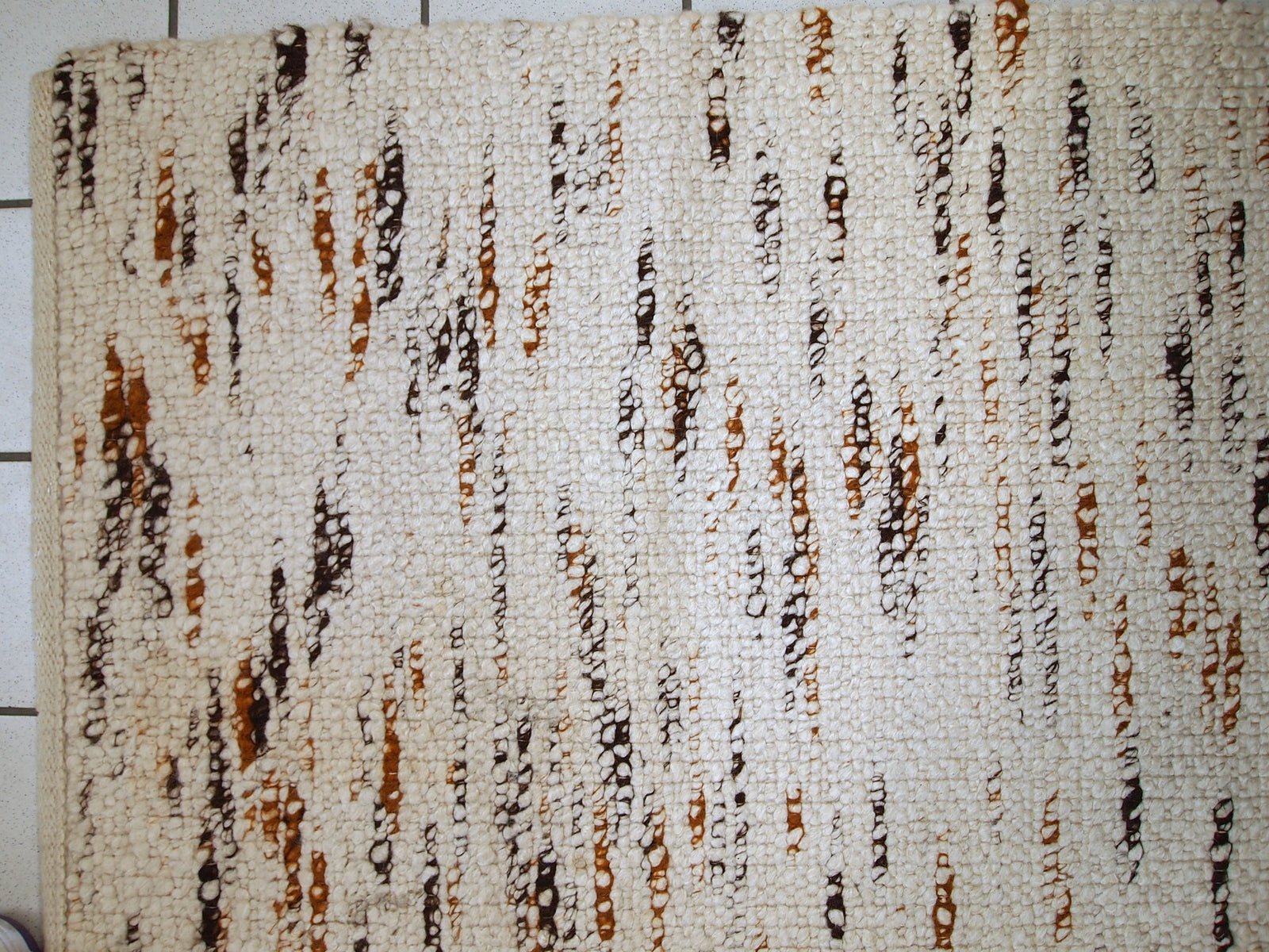 Handmade vintage Indian beige runner in wool. It is very soft. The rug is in original good condition.