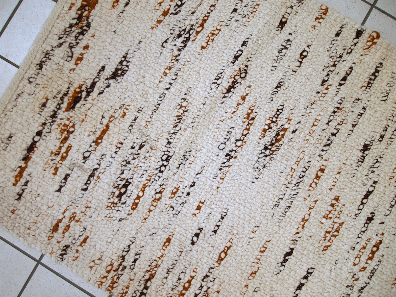 Handmade vintage Indian beige runner in wool. It is very soft. The rug is in original good condition.