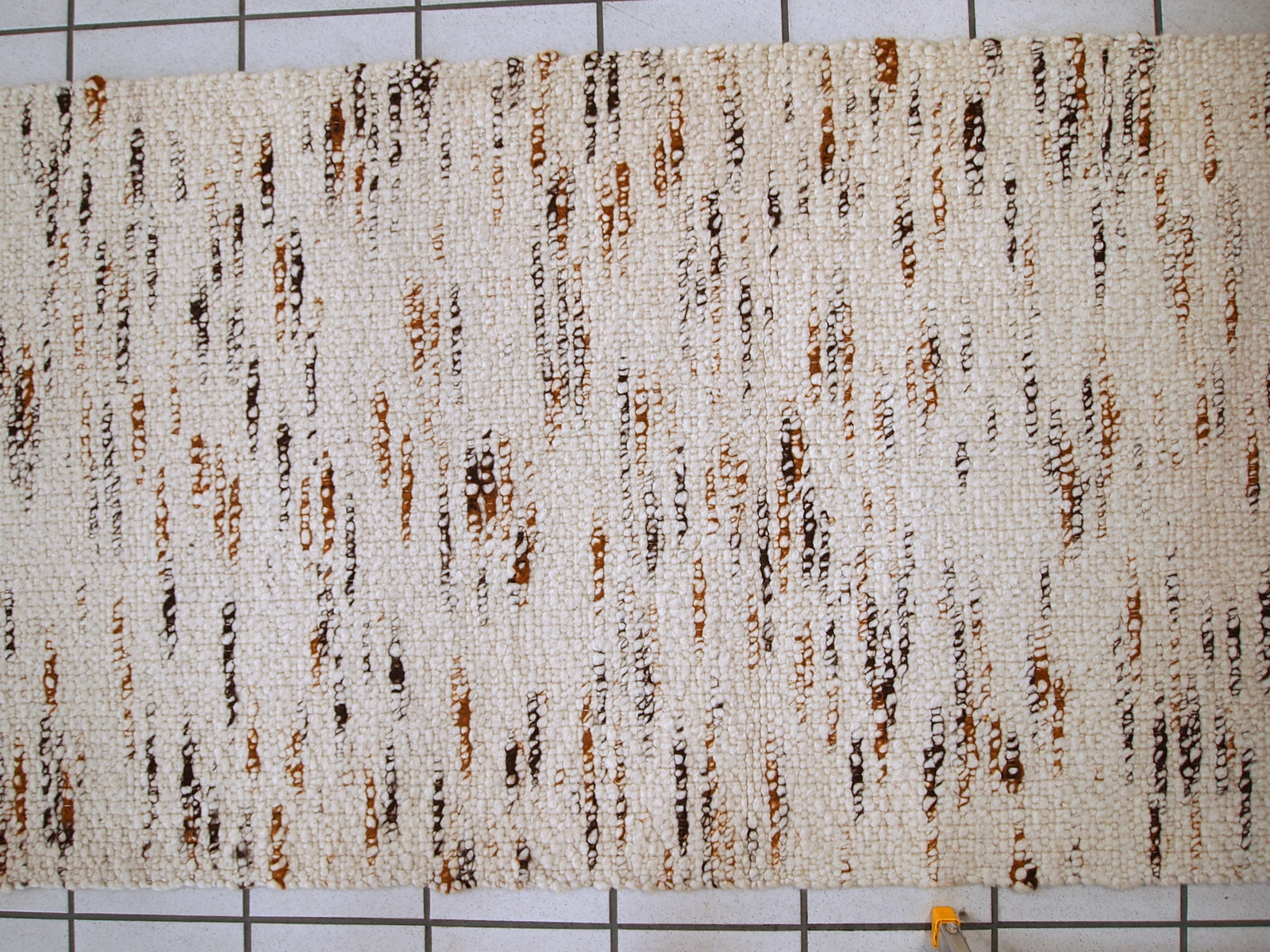 Handmade vintage Indian beige runner in wool. It is very soft. The rug is in original good condition.