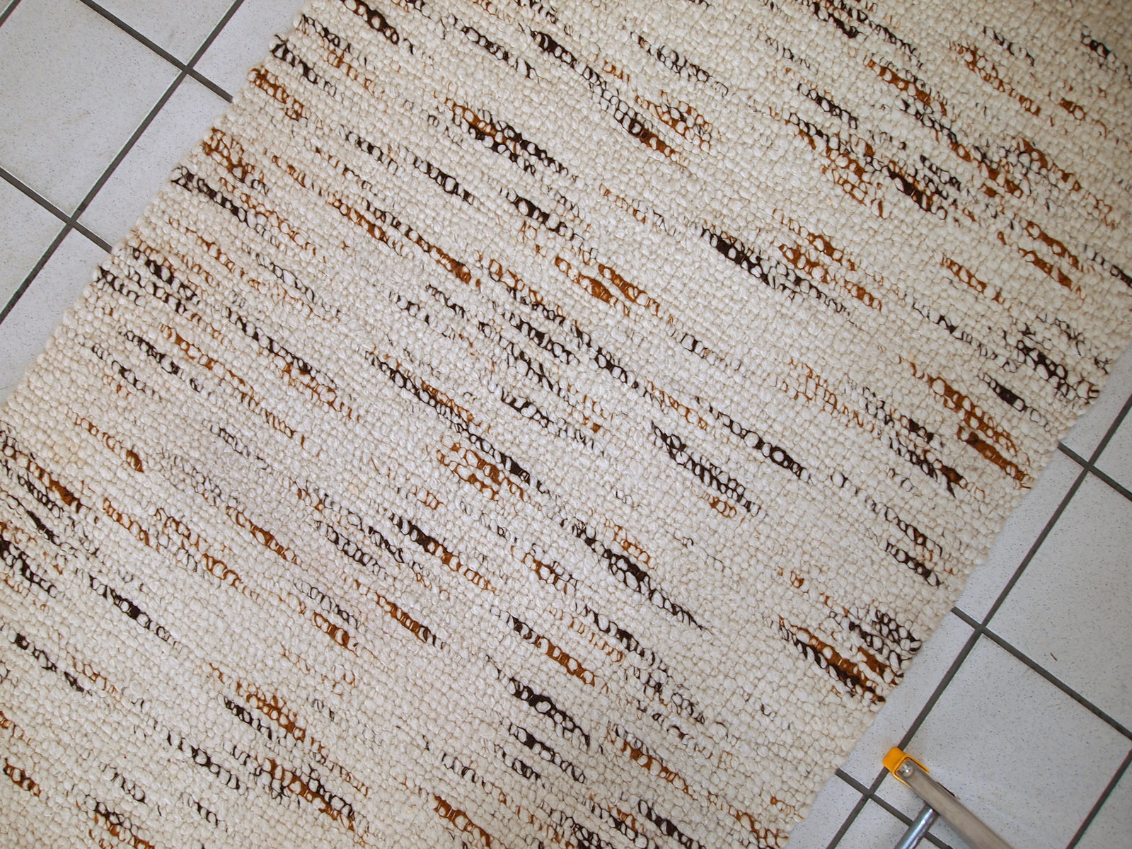 Handmade vintage Indian beige runner in wool. It is very soft. The rug is in original good condition.