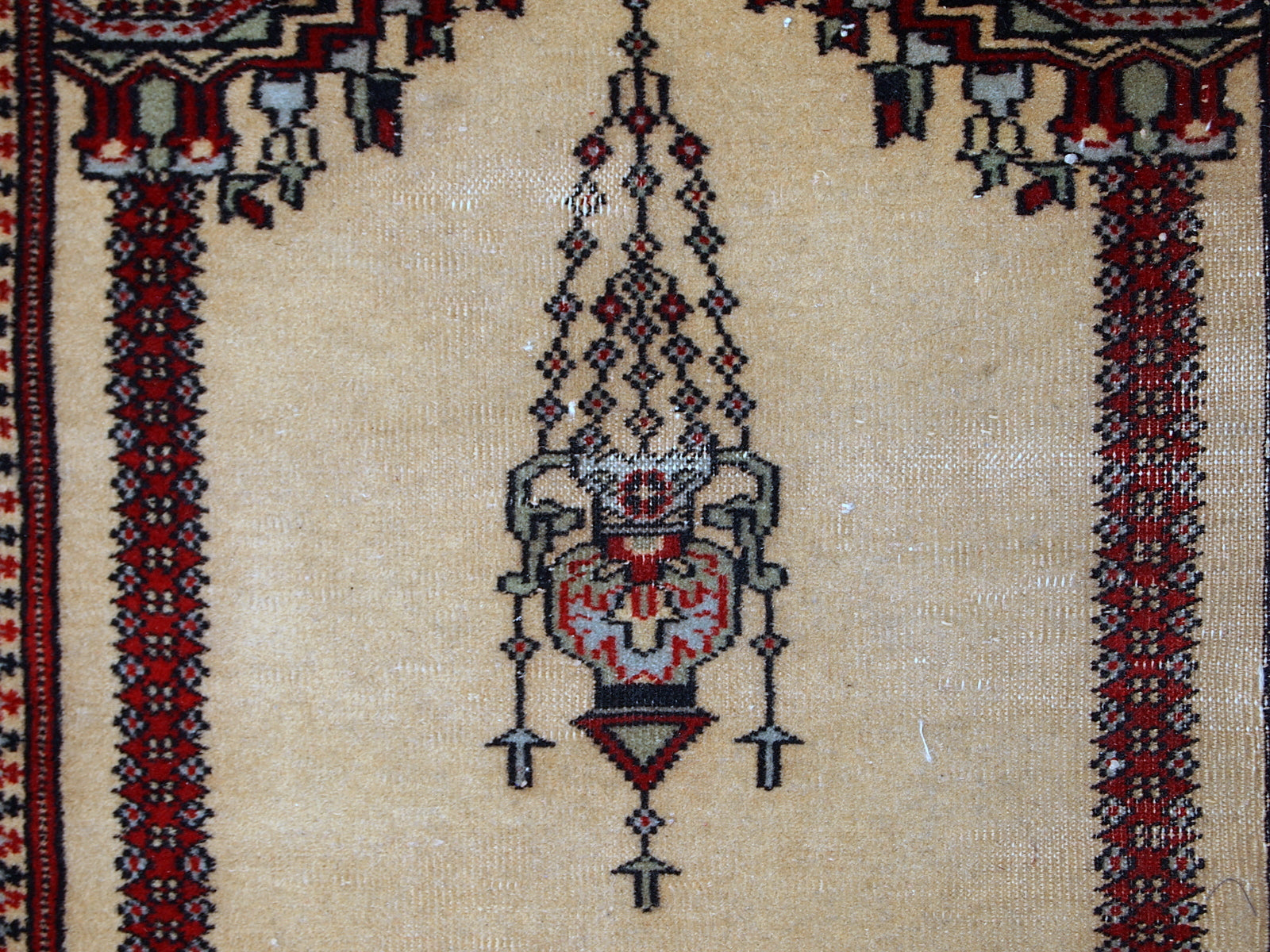 Vintage handmade Pakistani Lahore rug in original condition, it has some low pile due to age. The rug made in wool in the middle of 20th century.