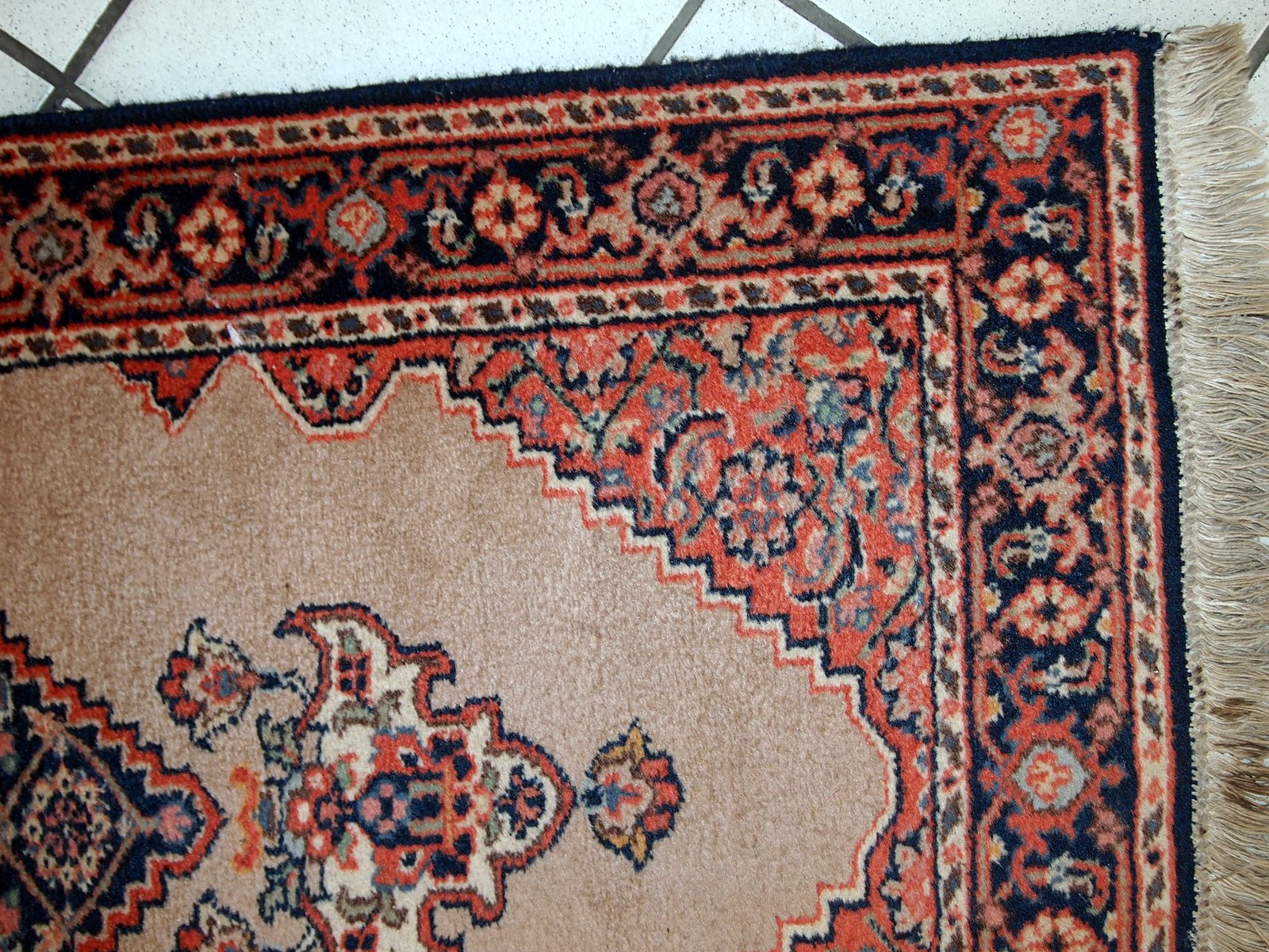 Vintage handmade Indo-Tabriz rug in original good condition. This rug has been made in the middle of 20th century in India.