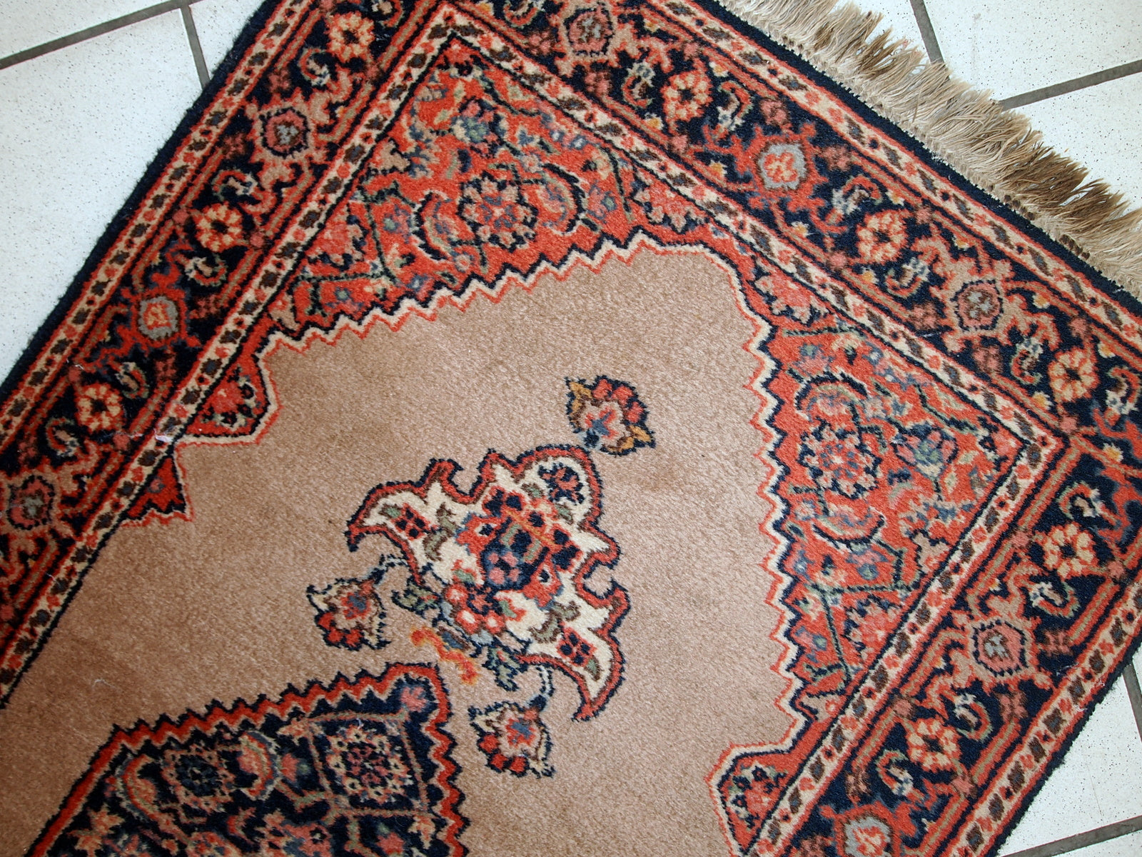 Vintage handmade Indo-Tabriz rug in original good condition. This rug has been made in the middle of 20th century in India.